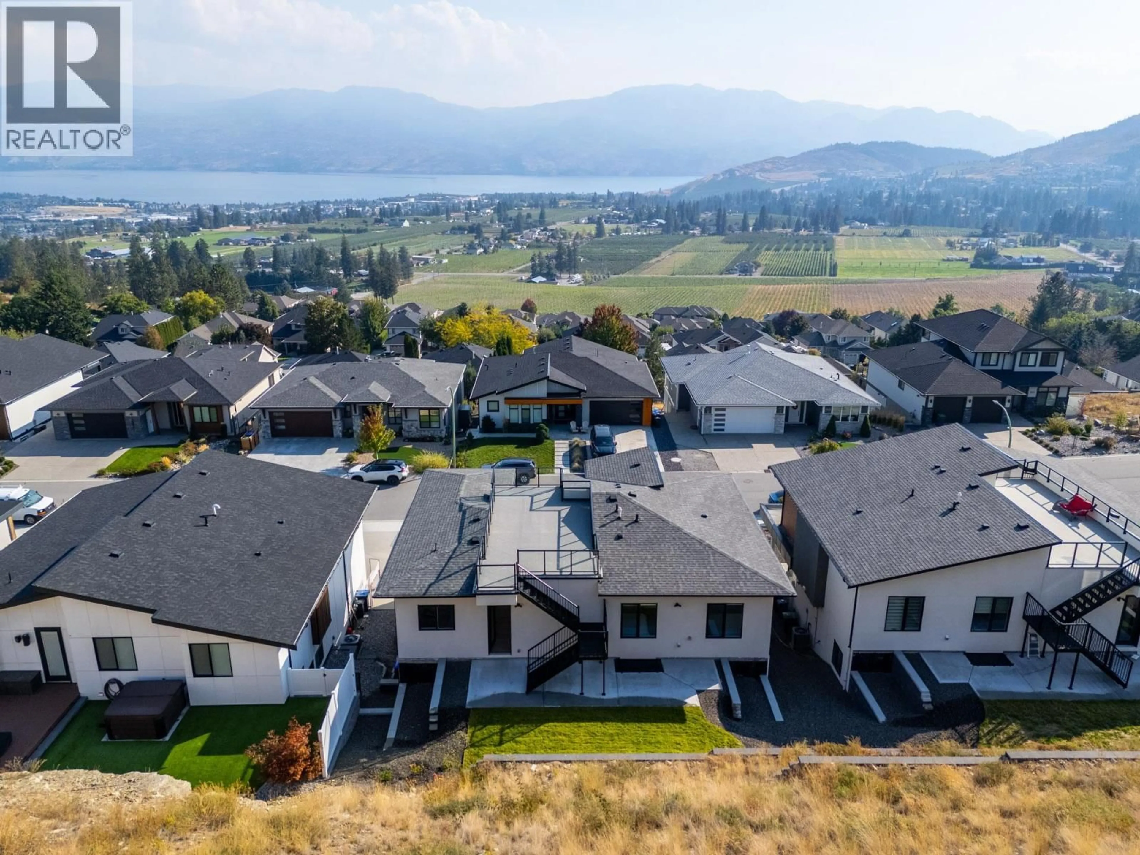A pic from outside/outdoor area/front of a property/back of a property/a pic from drone, mountain view for 2842 COPPER RIDGE DRIVE, West Kelowna British Columbia V4T0E7