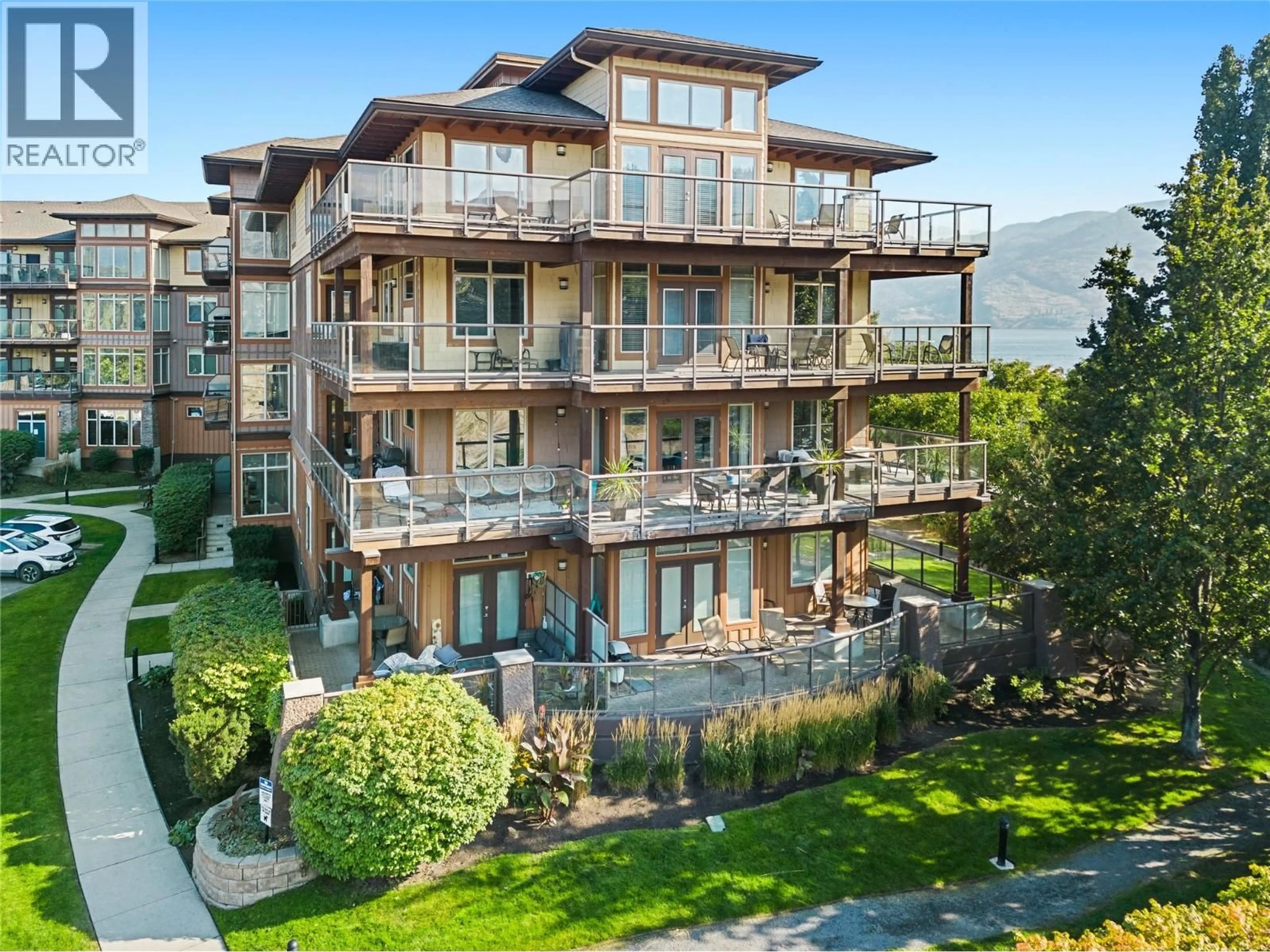 A pic from outside/outdoor area/front of a property/back of a property/a pic from drone, unknown for 238 - 4205 GELLATLY ROAD, West Kelowna British Columbia V4T2K2