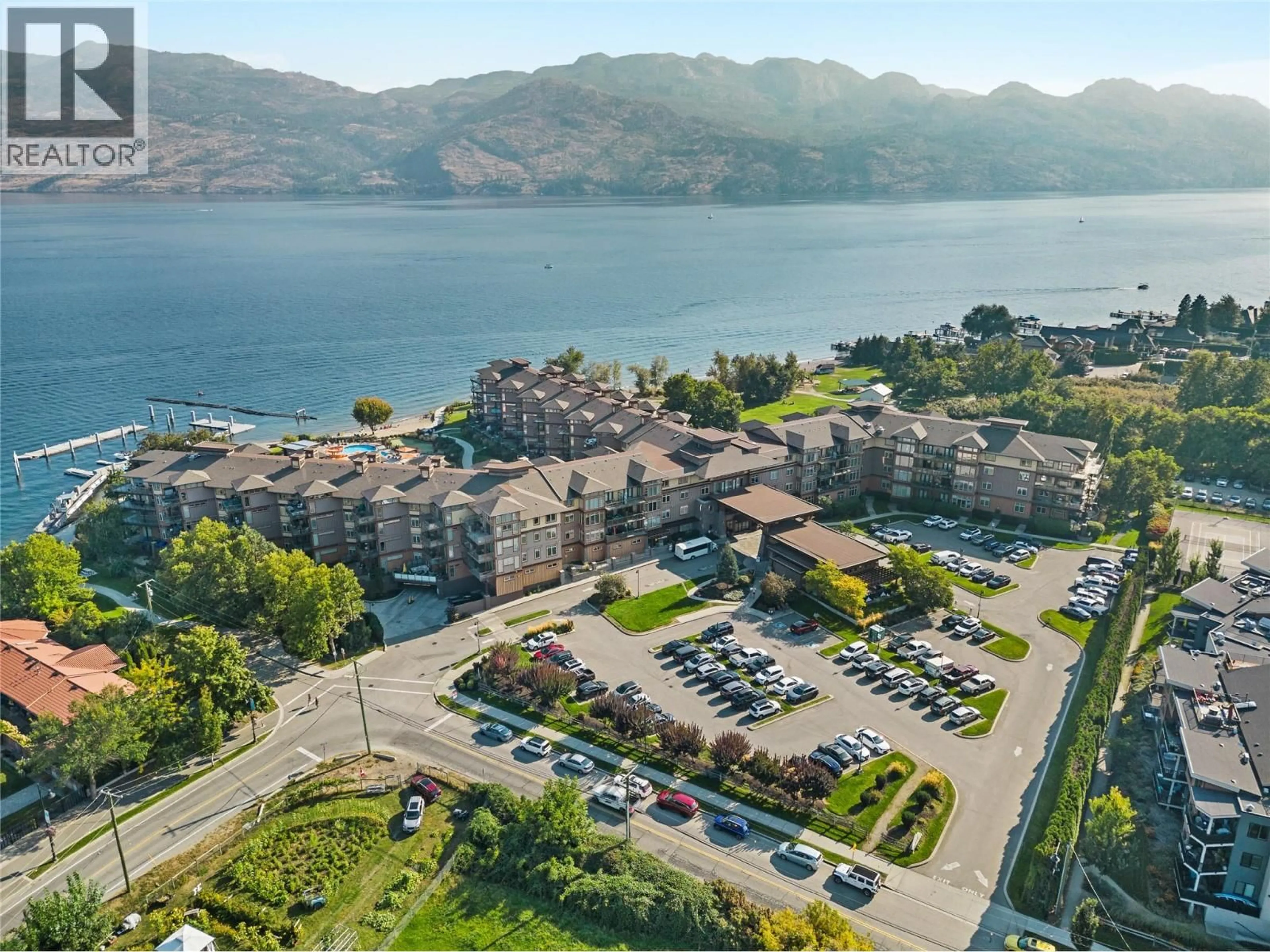 A pic from outside/outdoor area/front of a property/back of a property/a pic from drone, water/lake/river/ocean view for 238 - 4205 GELLATLY ROAD, West Kelowna British Columbia V4T2K2