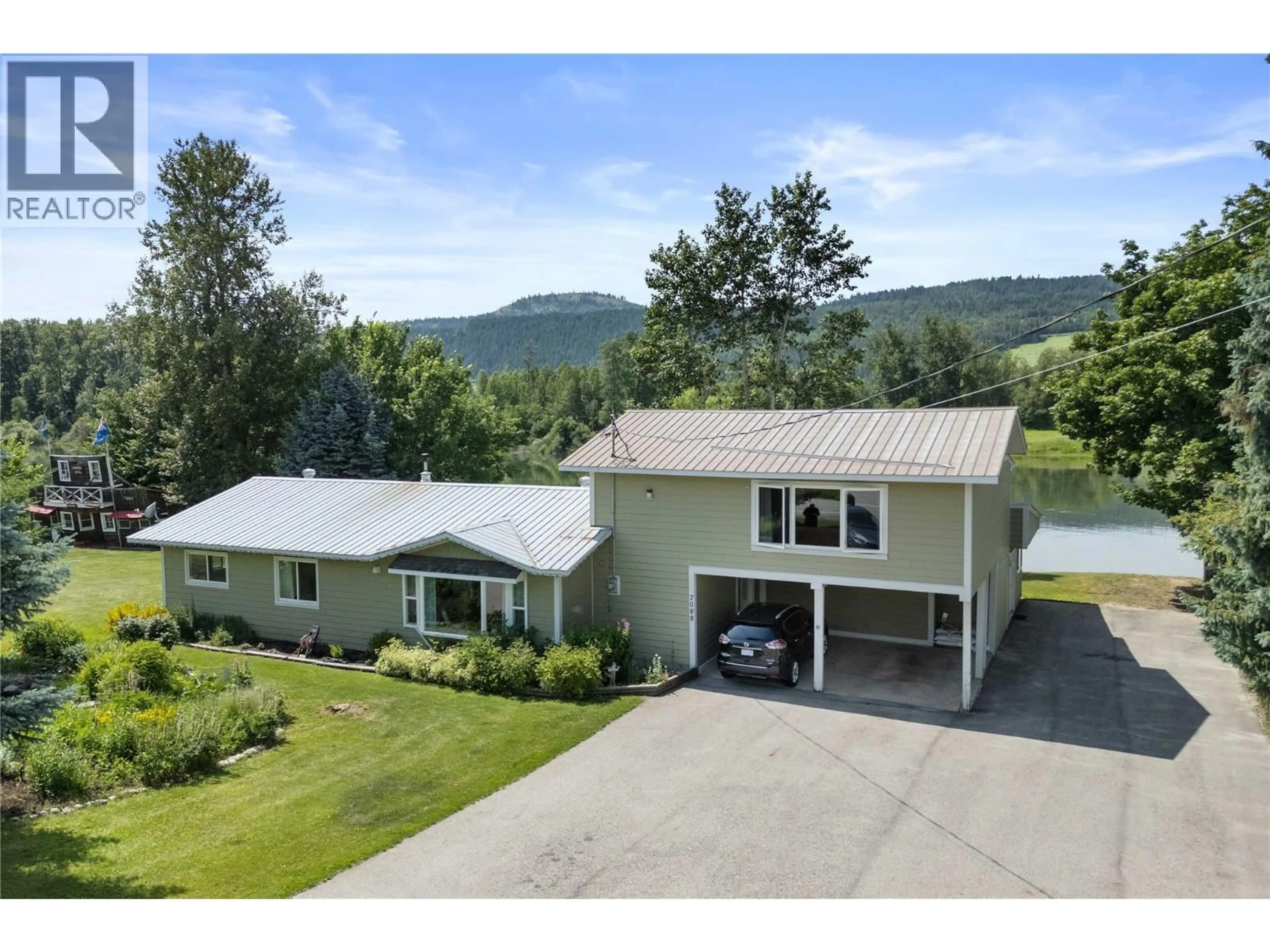 A pic from outside/outdoor area/front of a property/back of a property/a pic from drone, mountain view for 7088 97A HIGHWAY, Grindrod British Columbia V0E1Y0