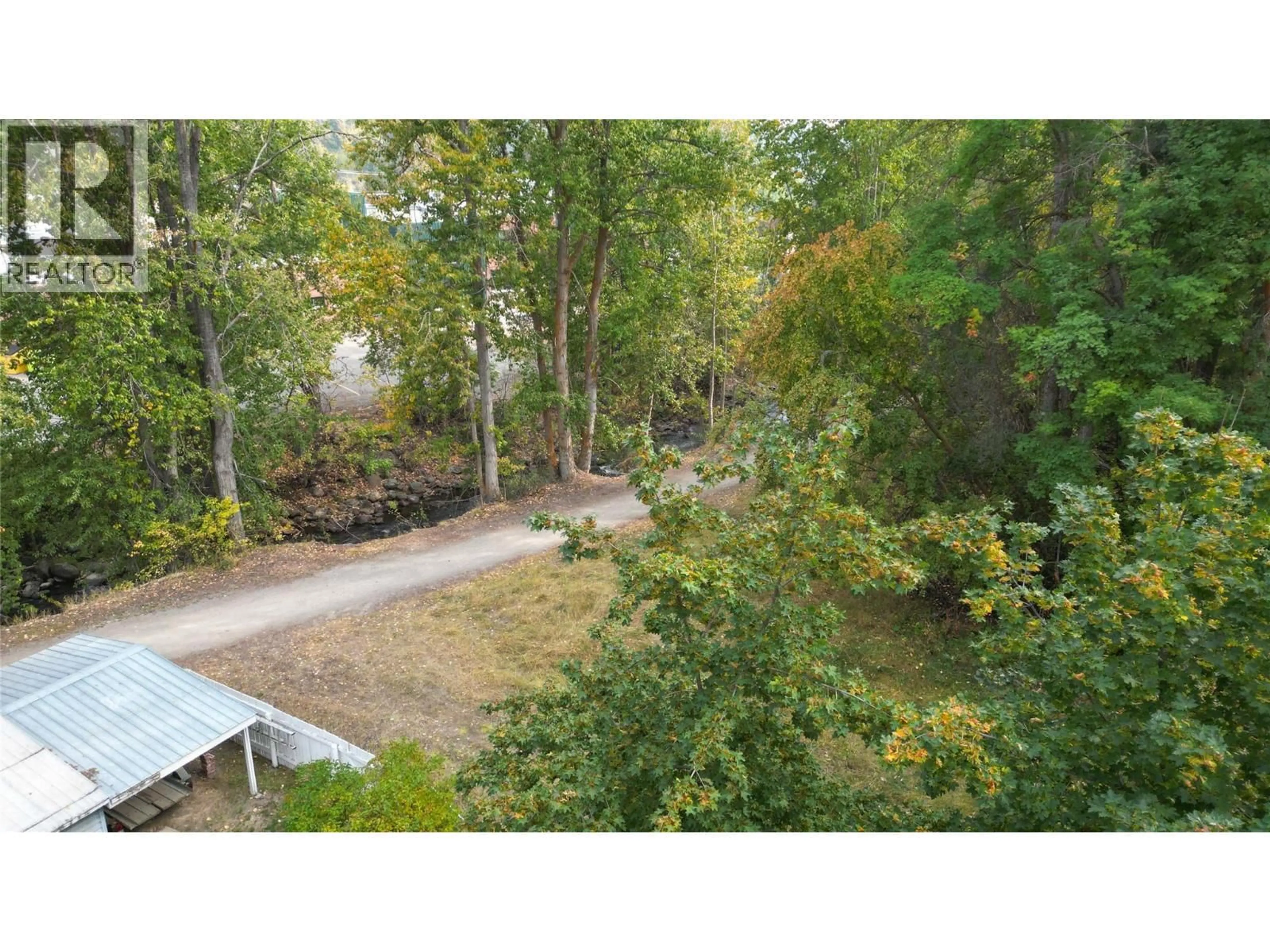 A pic from outside/outdoor area/front of a property/back of a property/a pic from drone, forest/trees view for 380 BINGAY STREET, Kimberley British Columbia V1A1X4