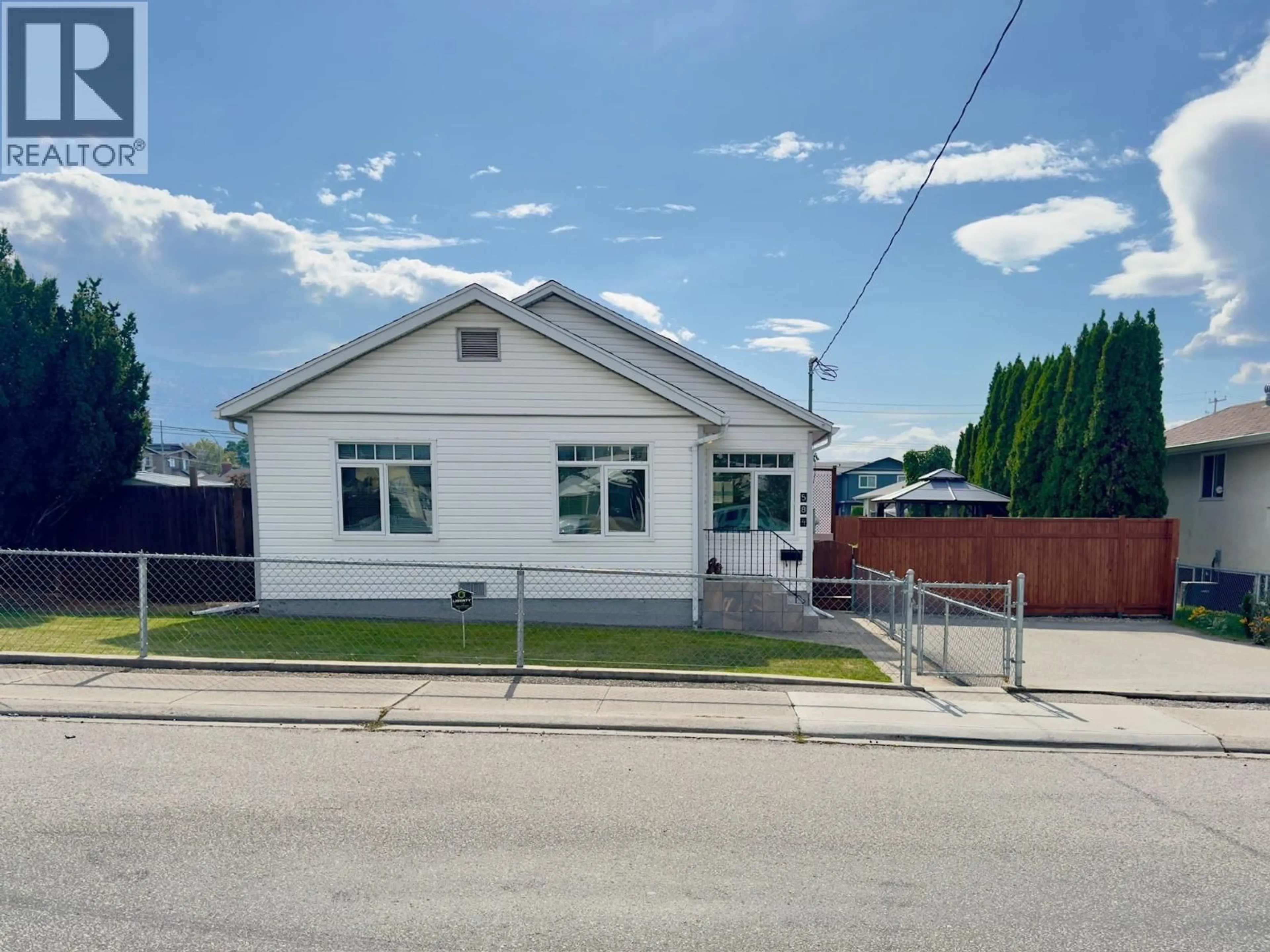 A pic from outside/outdoor area/front of a property/back of a property/a pic from drone, building for 584 EDNA AVENUE, Penticton British Columbia V2A2M2