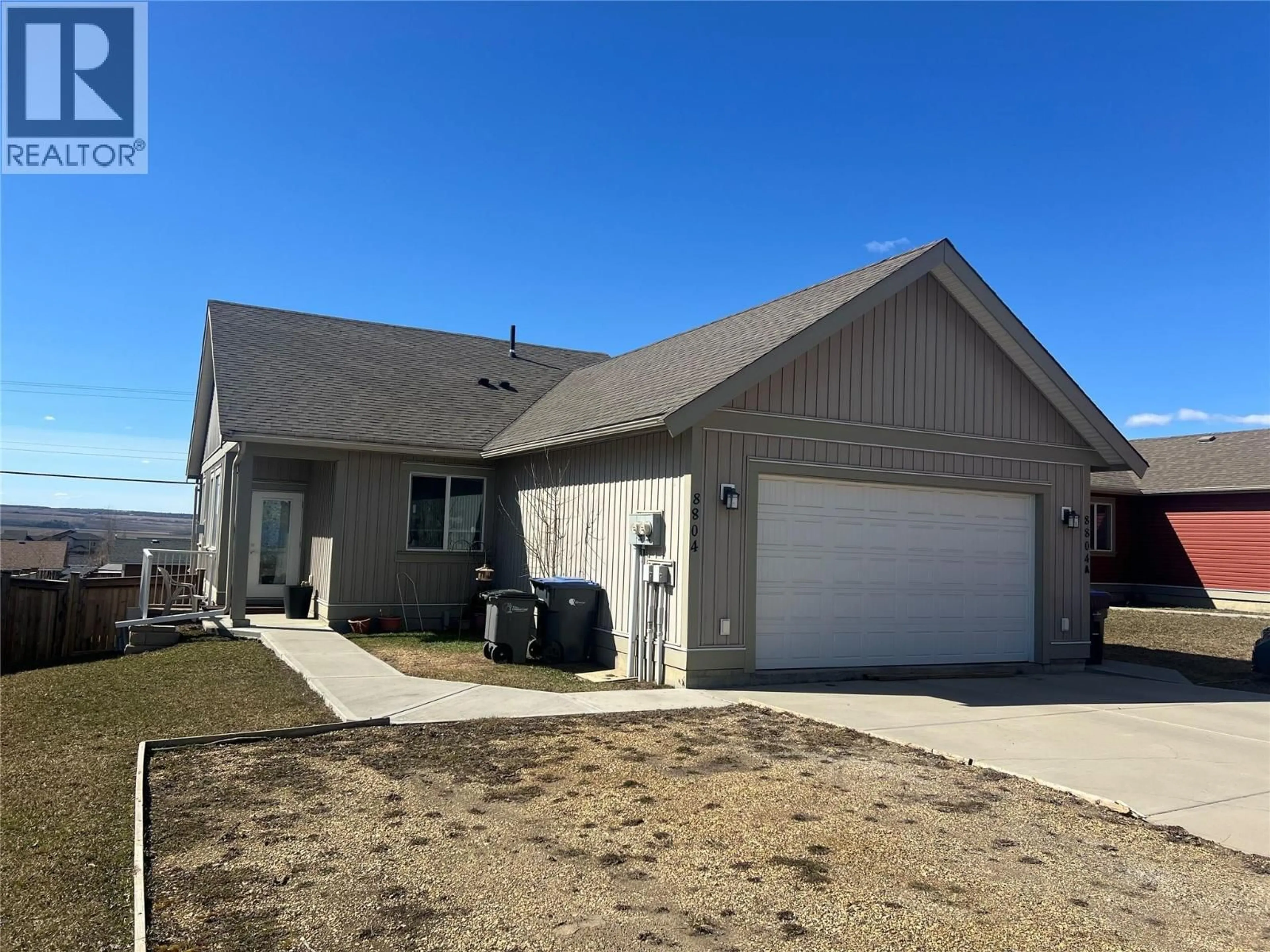 Home with vinyl exterior material, street for 8804 17 STREET, Dawson Creek British Columbia V1G0H2