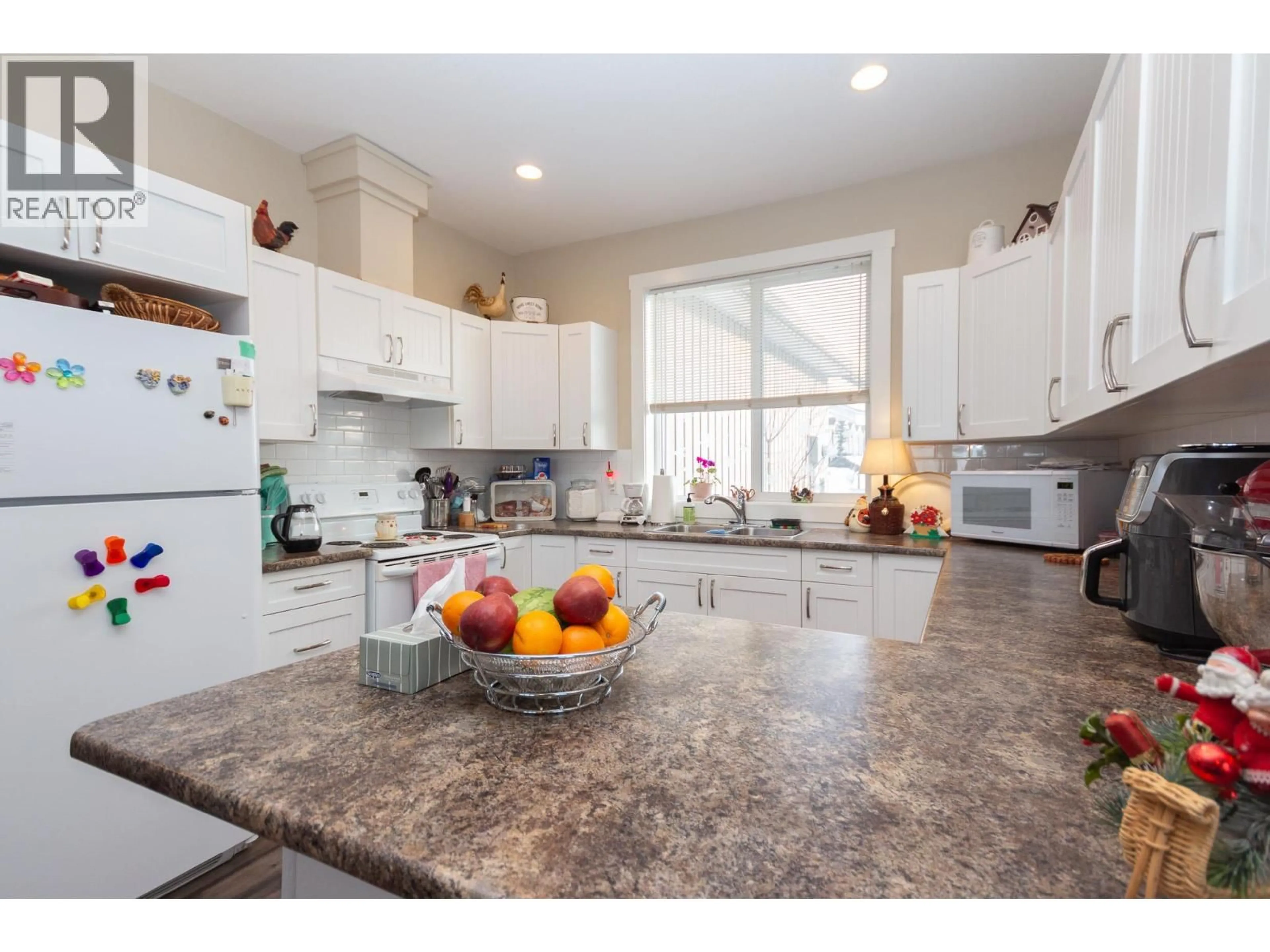 Open concept kitchen, ceramic/tile floor for 8804 17 STREET, Dawson Creek British Columbia V1G0H2
