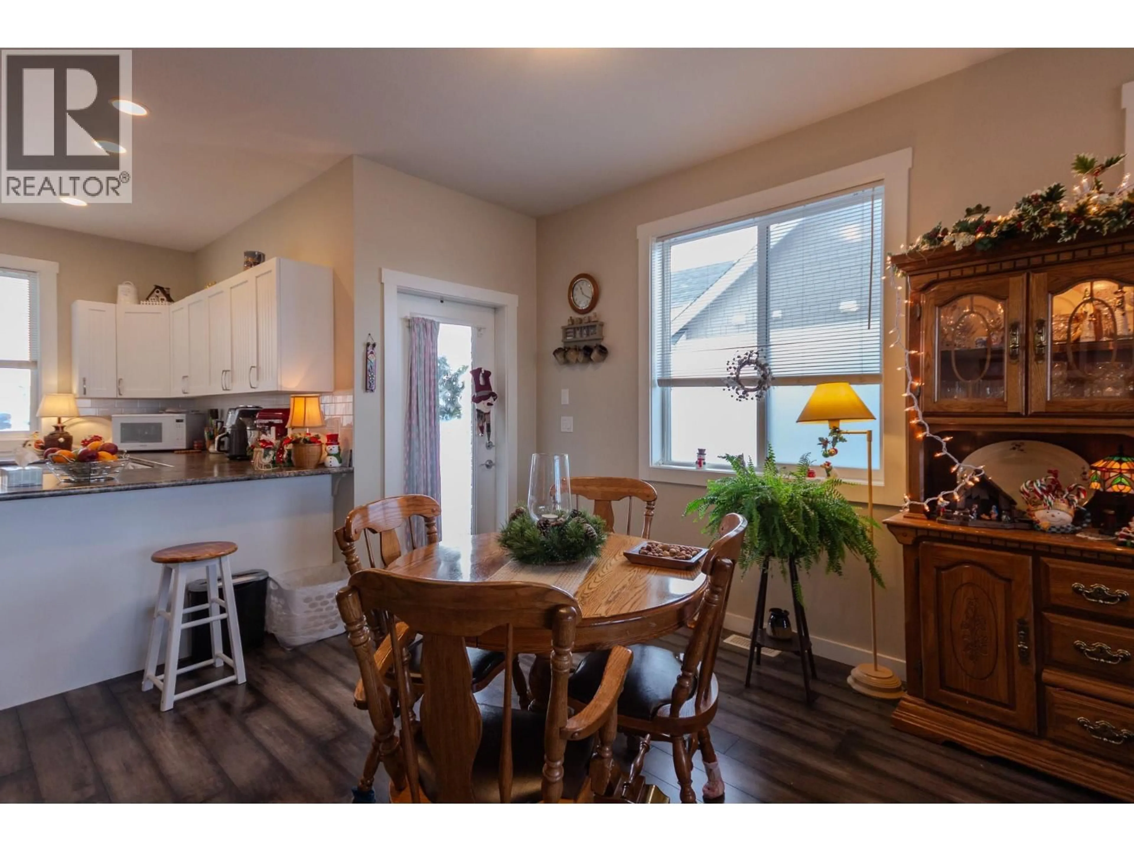 Open concept kitchen, wood/laminate floor for 8804 17 STREET, Dawson Creek British Columbia V1G0H2