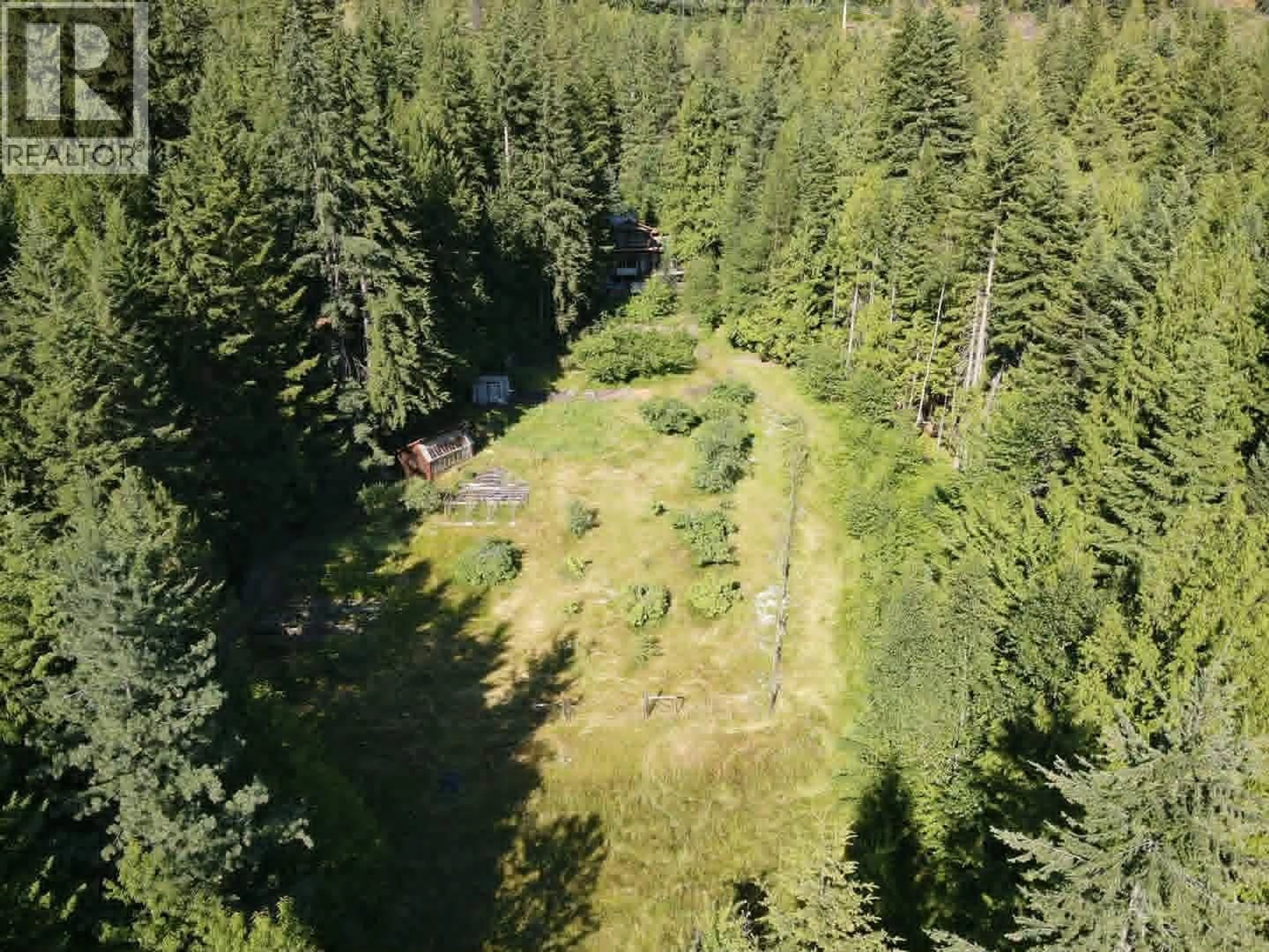 A pic from outside/outdoor area/front of a property/back of a property/a pic from drone, forest/trees view for 4512 HIGHWAY 6 OTHER, Burton British Columbia V0G1R1