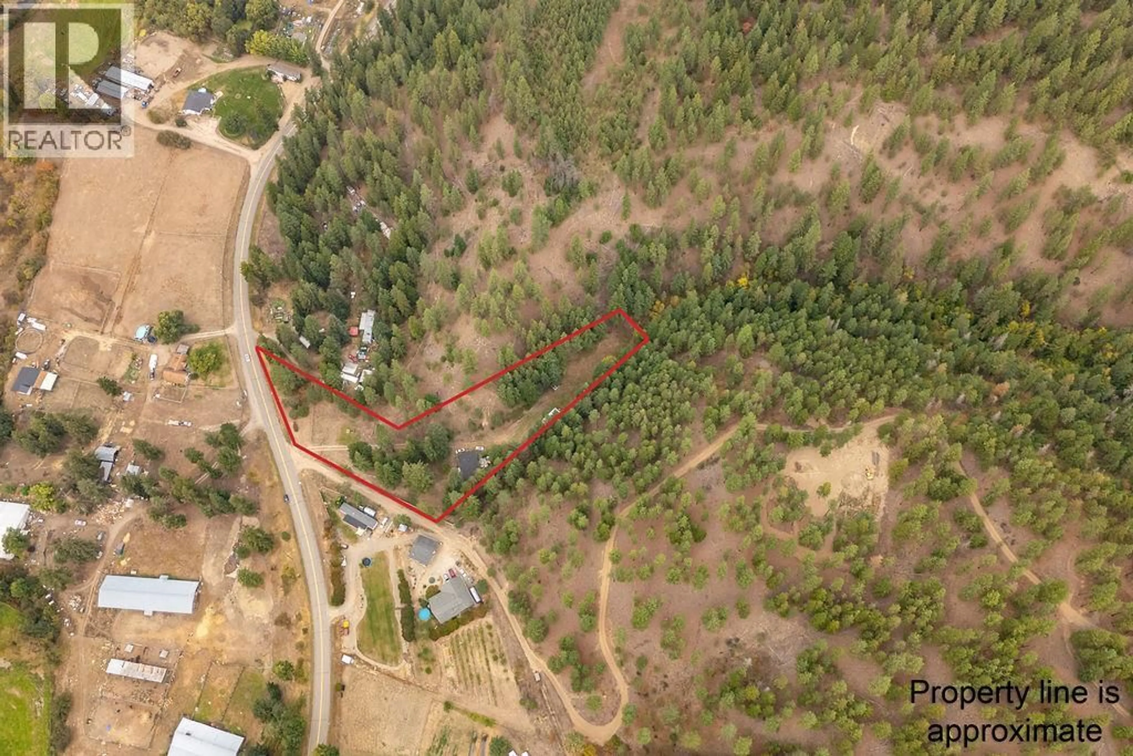A pic from outside/outdoor area/front of a property/back of a property/a pic from drone, forest/trees view for 2429 SALMON RIVER ROAD, Salmon Arm British Columbia V1E4M1