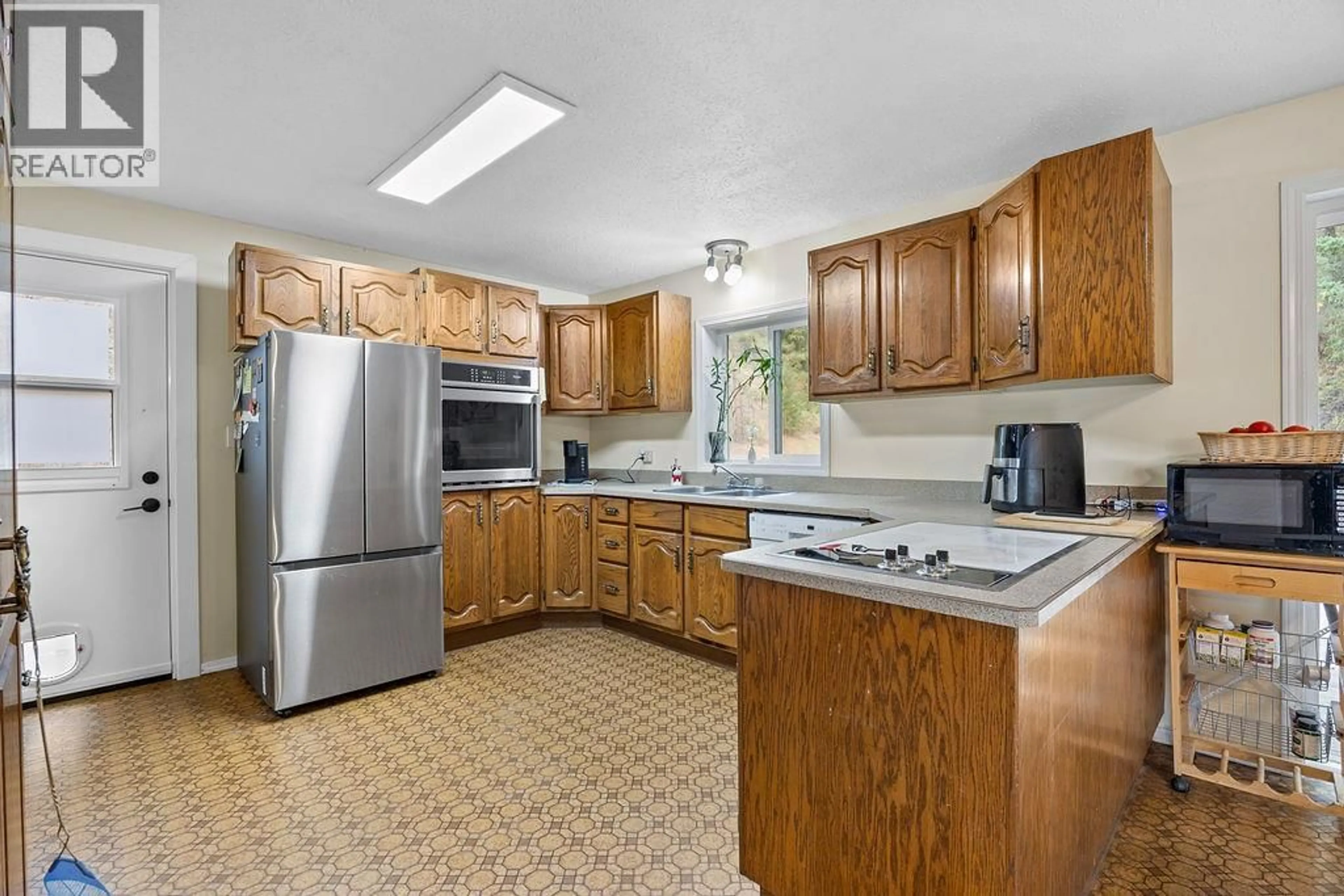 Standard kitchen, ceramic/tile floor for 2429 SALMON RIVER ROAD, Salmon Arm British Columbia V1E4M1