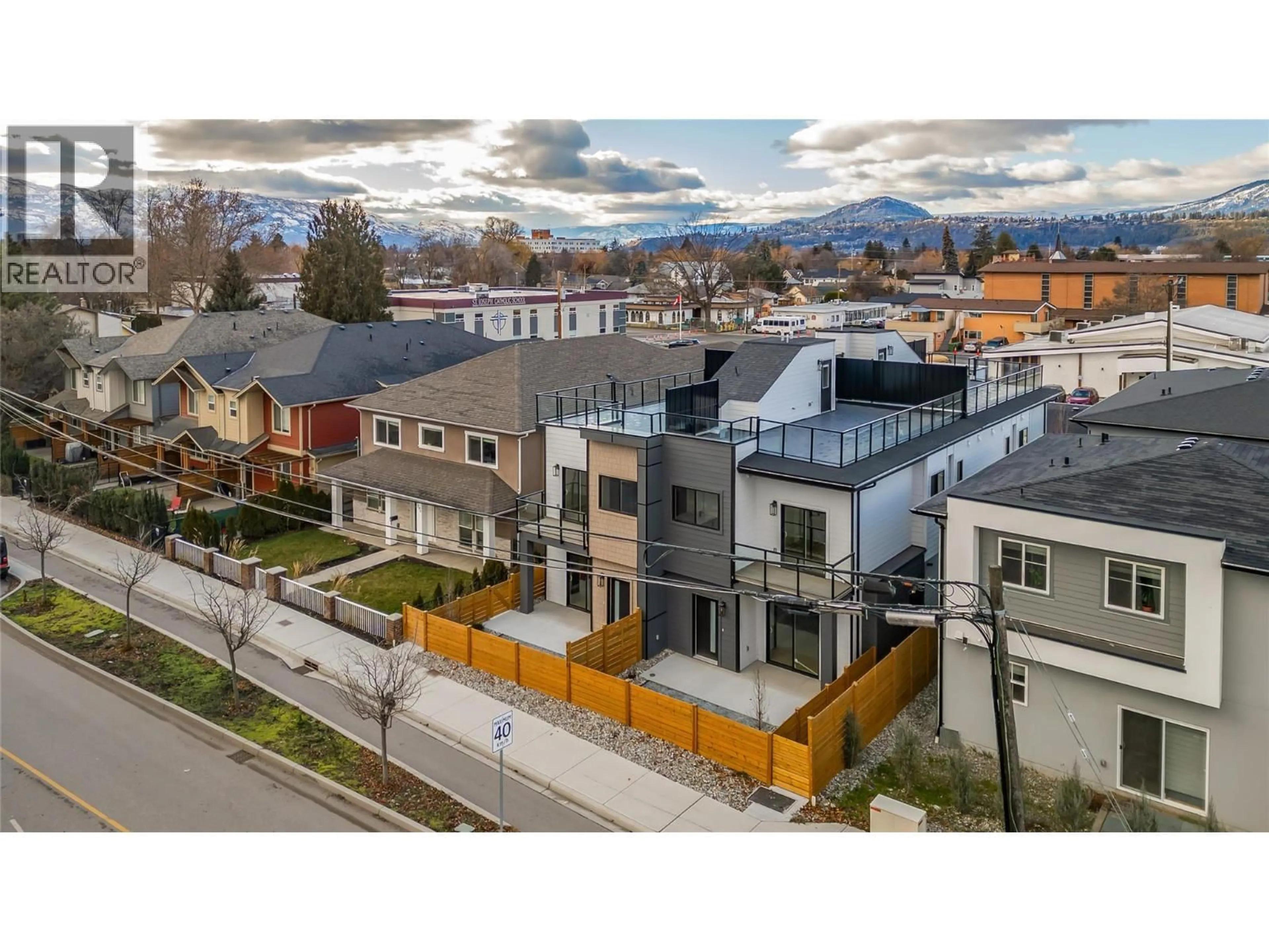 A pic from outside/outdoor area/front of a property/back of a property/a pic from drone, mountain view for 2 - 1916 ETHEL STREET, Kelowna British Columbia V1Y2Z5