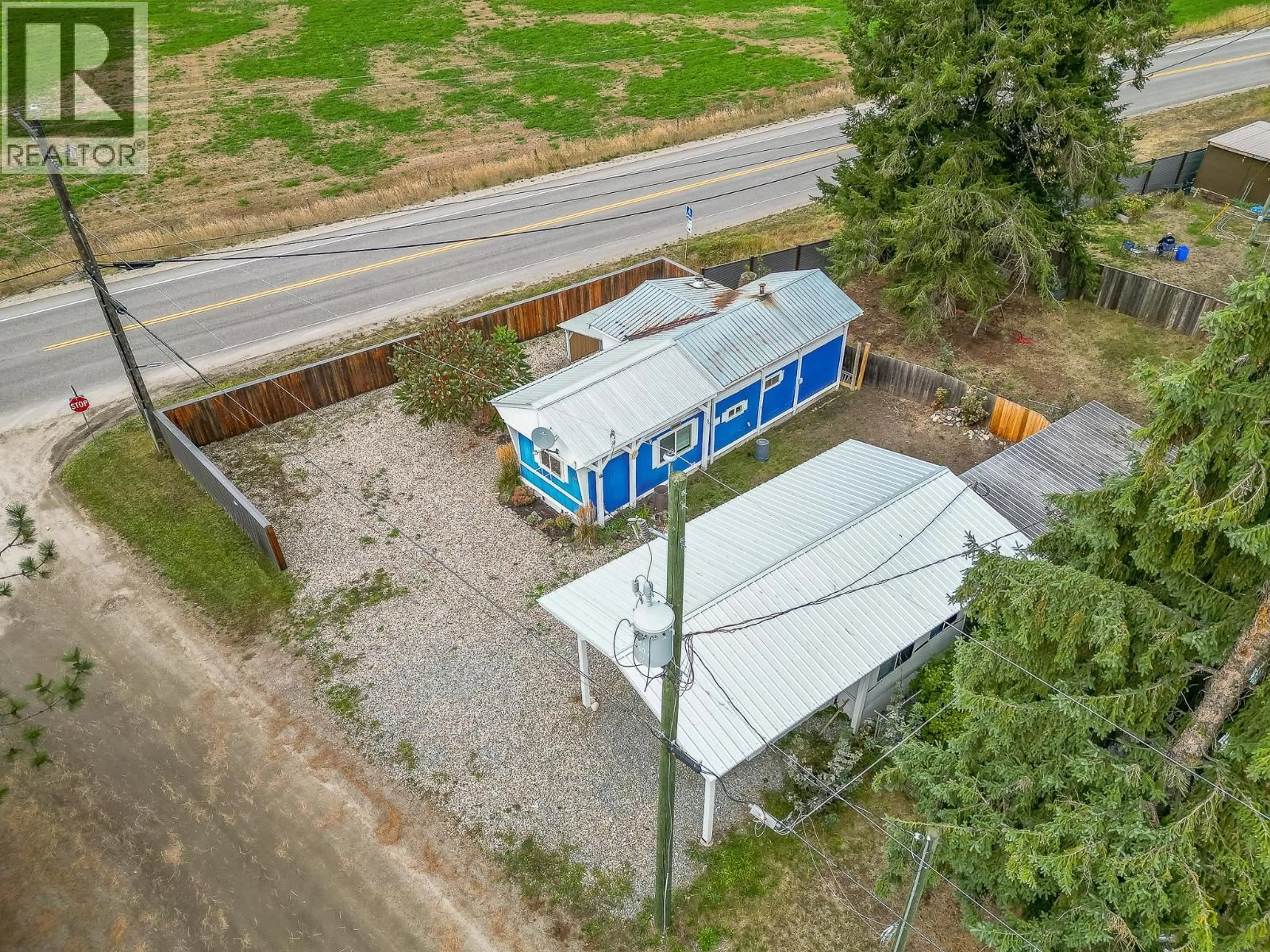 A pic from outside/outdoor area/front of a property/back of a property/a pic from drone, street for 1 ROBSON ROAD, Mara British Columbia V0E2K0