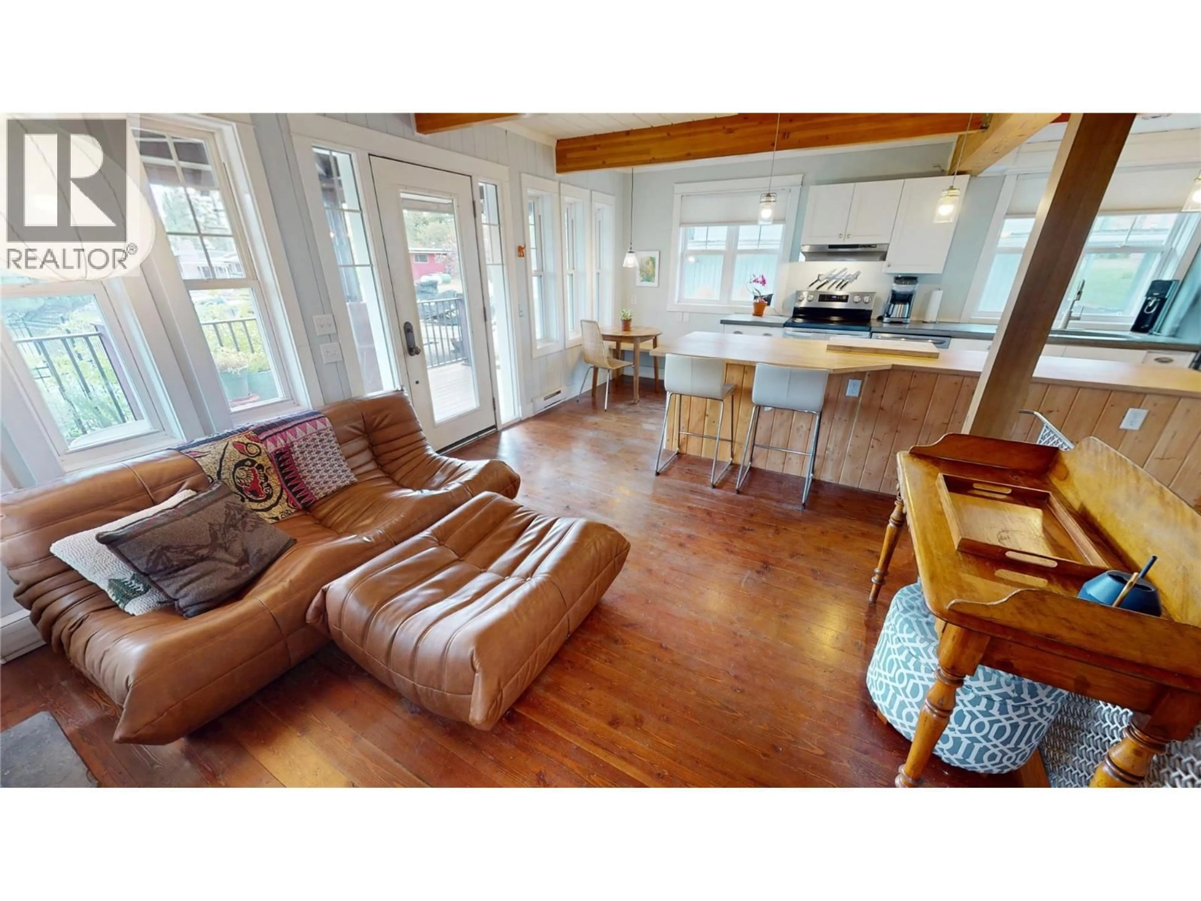 Open concept kitchen, wood/laminate floor for 1738 9TH AVENUE, Invermere British Columbia V0A1K0