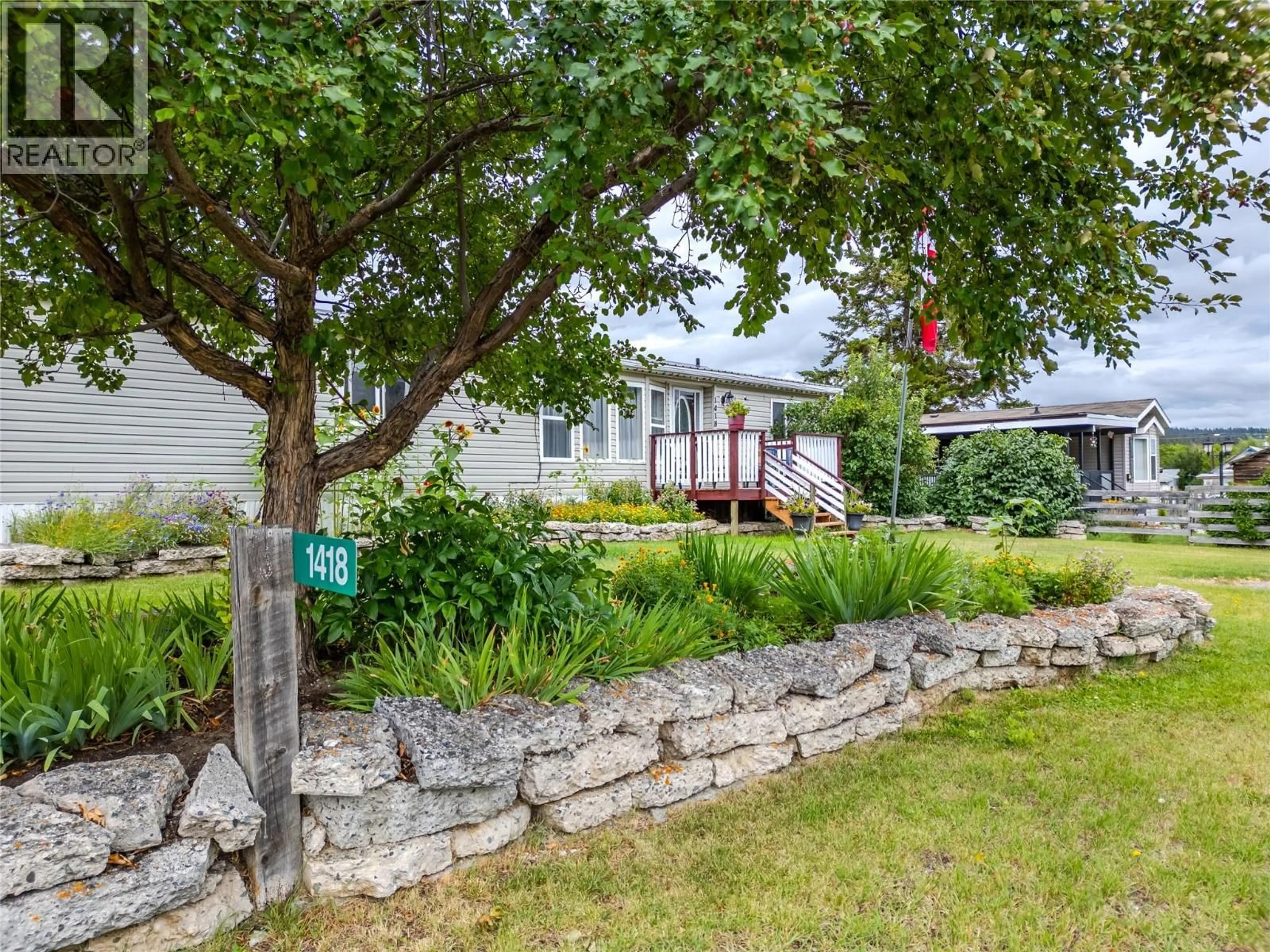 A pic from outside/outdoor area/front of a property/back of a property/a pic from drone, street for 1418 SOUES STREET, Clinton British Columbia V0K1K0