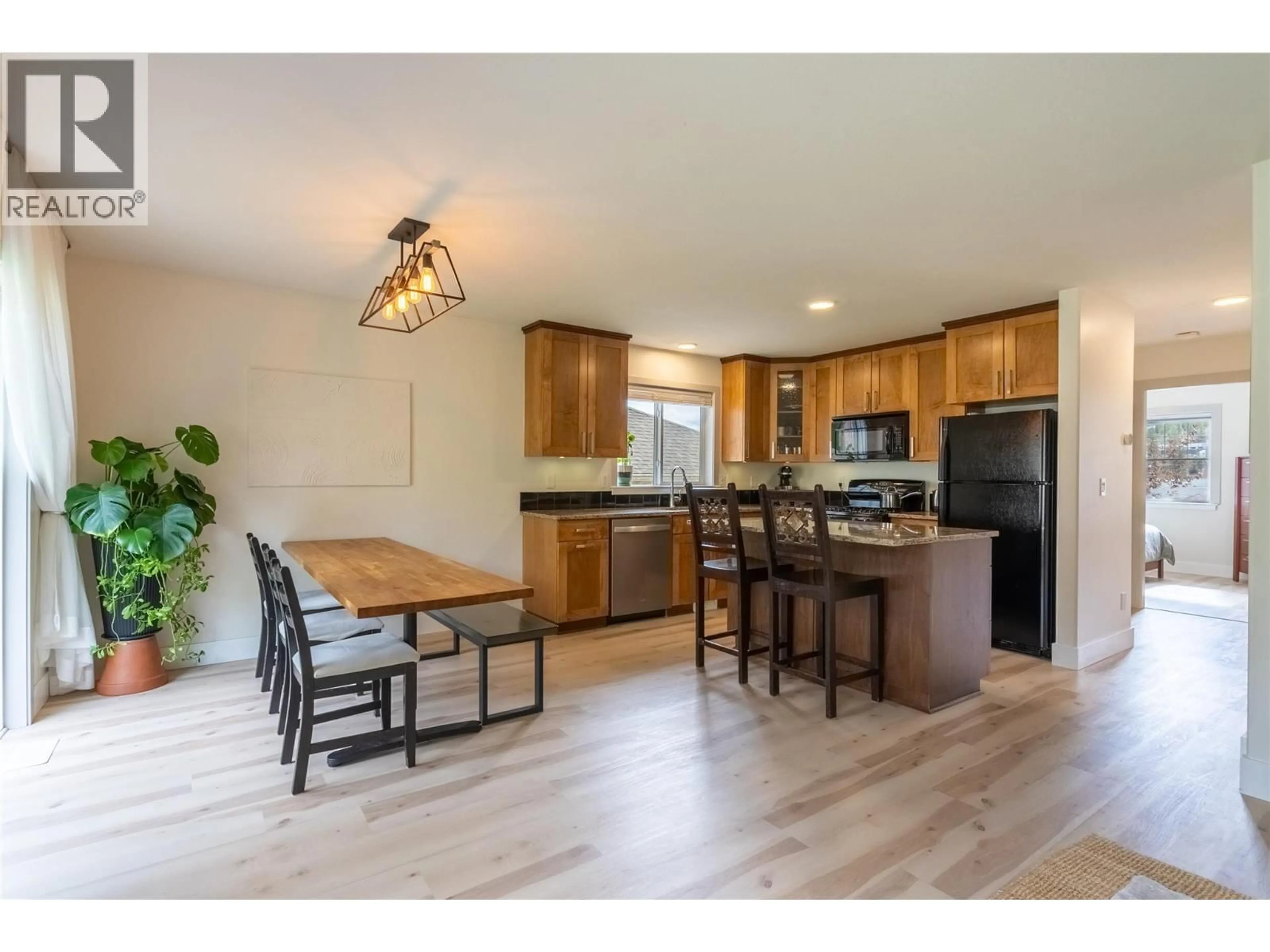 Open concept kitchen, wood/laminate floor for 30 - 1940 HILLSIDE DRIVE, Kamloops British Columbia V2E2T3