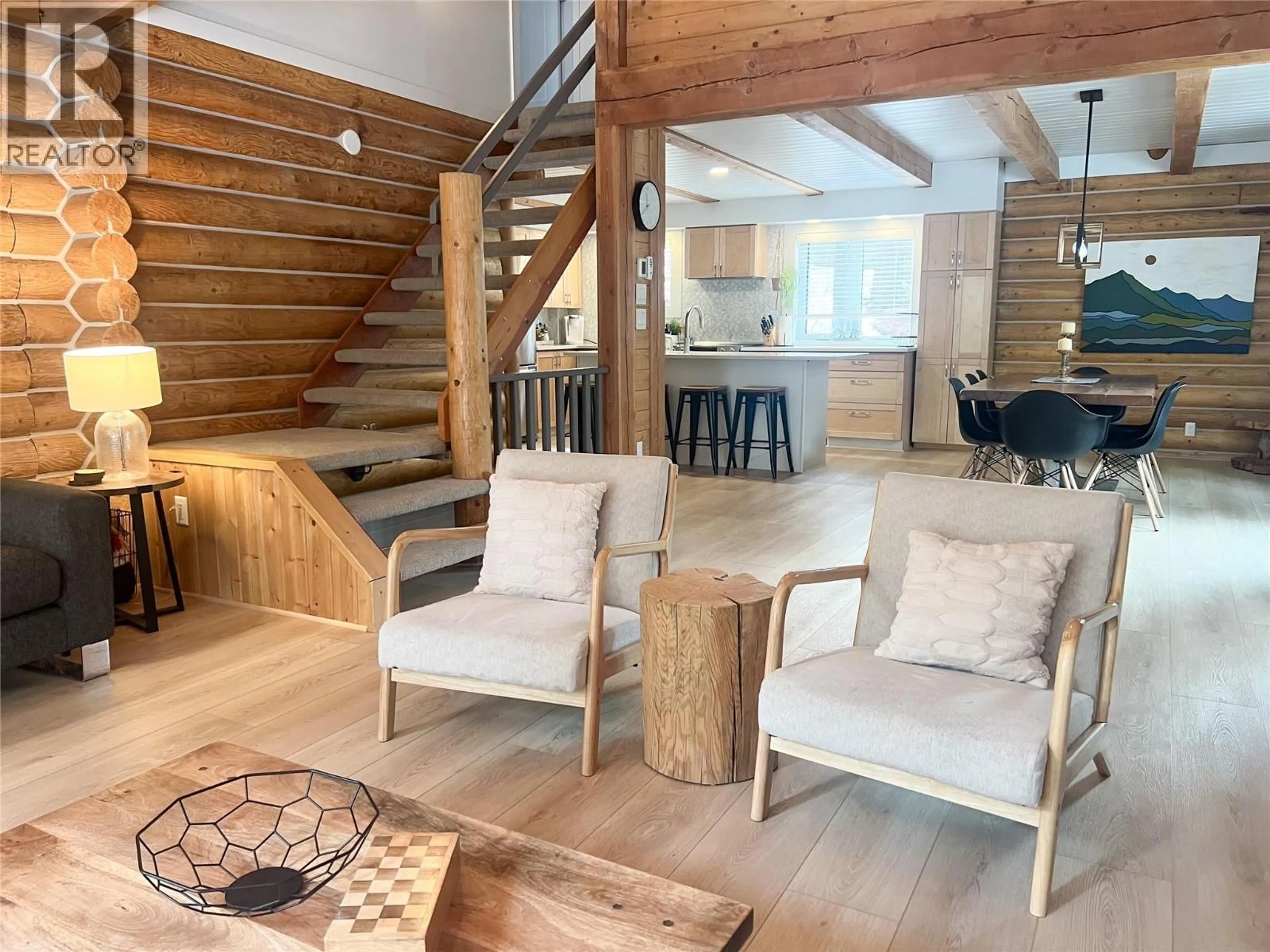 Living room with furniture, wood/laminate floor for 2094 PANORAMA DRIVE, Panorama British Columbia V0A1T0