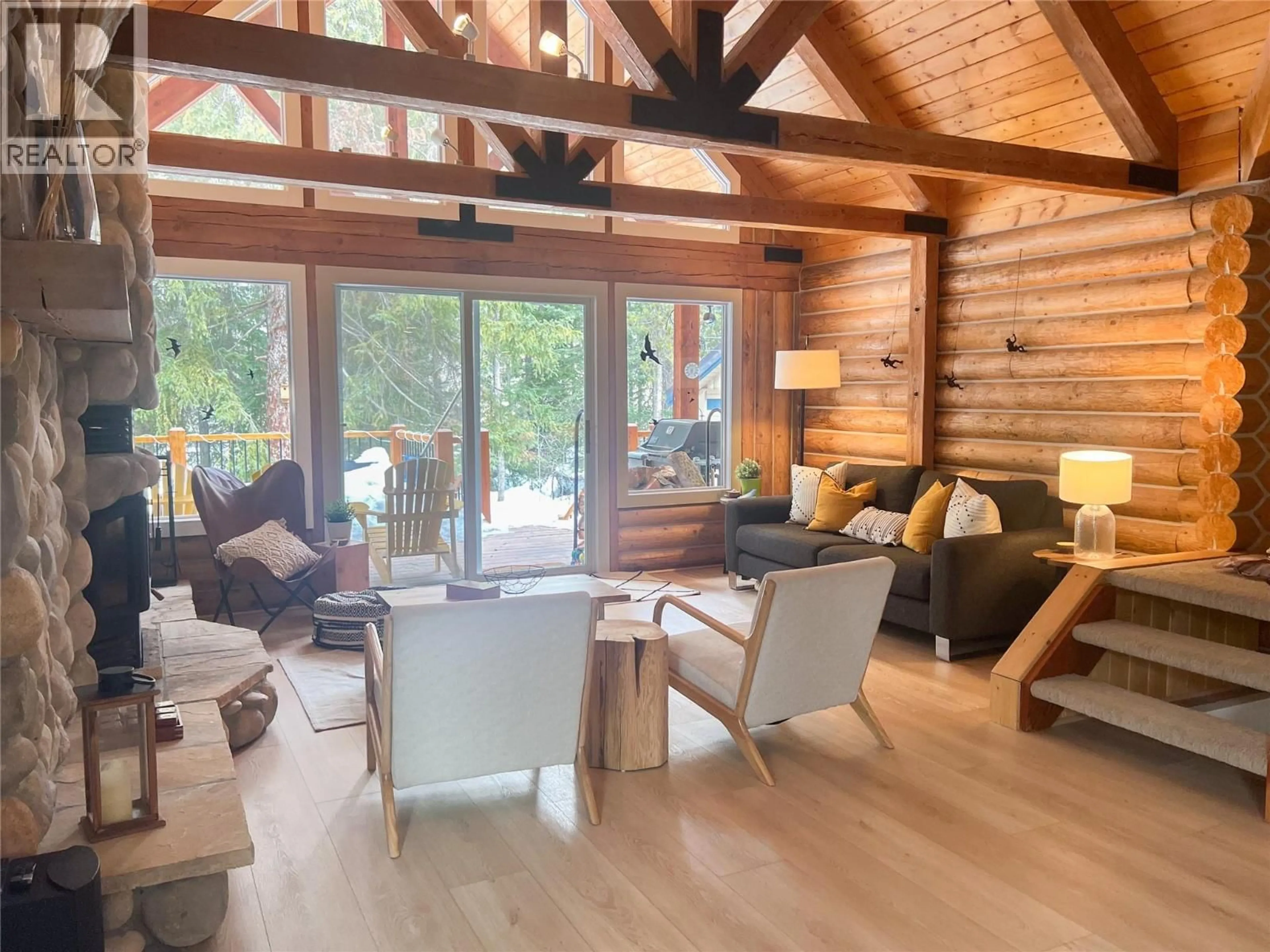 Living room with furniture, wood/laminate floor for 2094 PANORAMA DRIVE, Panorama British Columbia V0A1T0