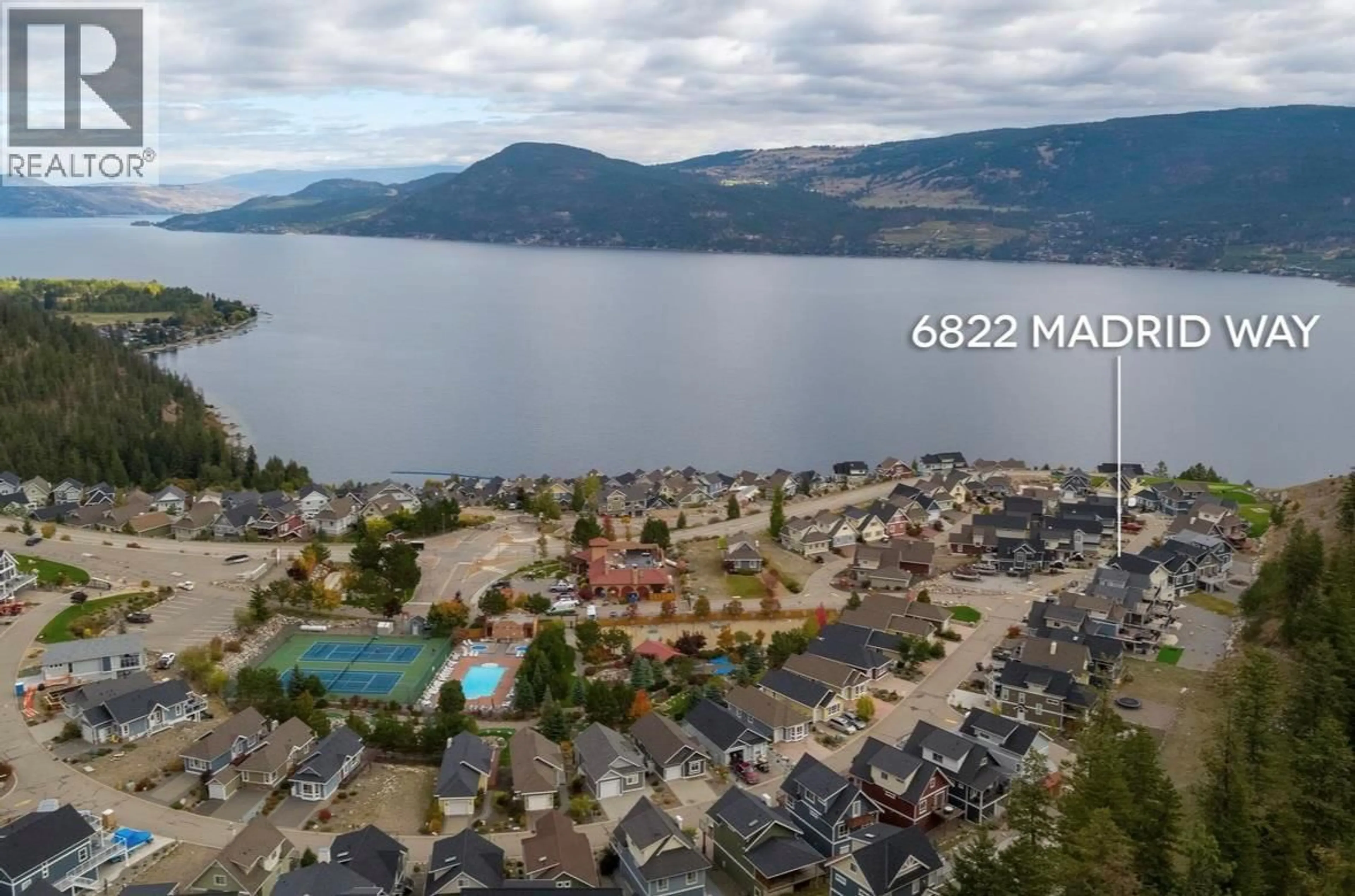 A pic from outside/outdoor area/front of a property/back of a property/a pic from drone, water/lake/river/ocean view for 310 - 6822 MADRID WAY, Kelowna British Columbia V1Z3R8