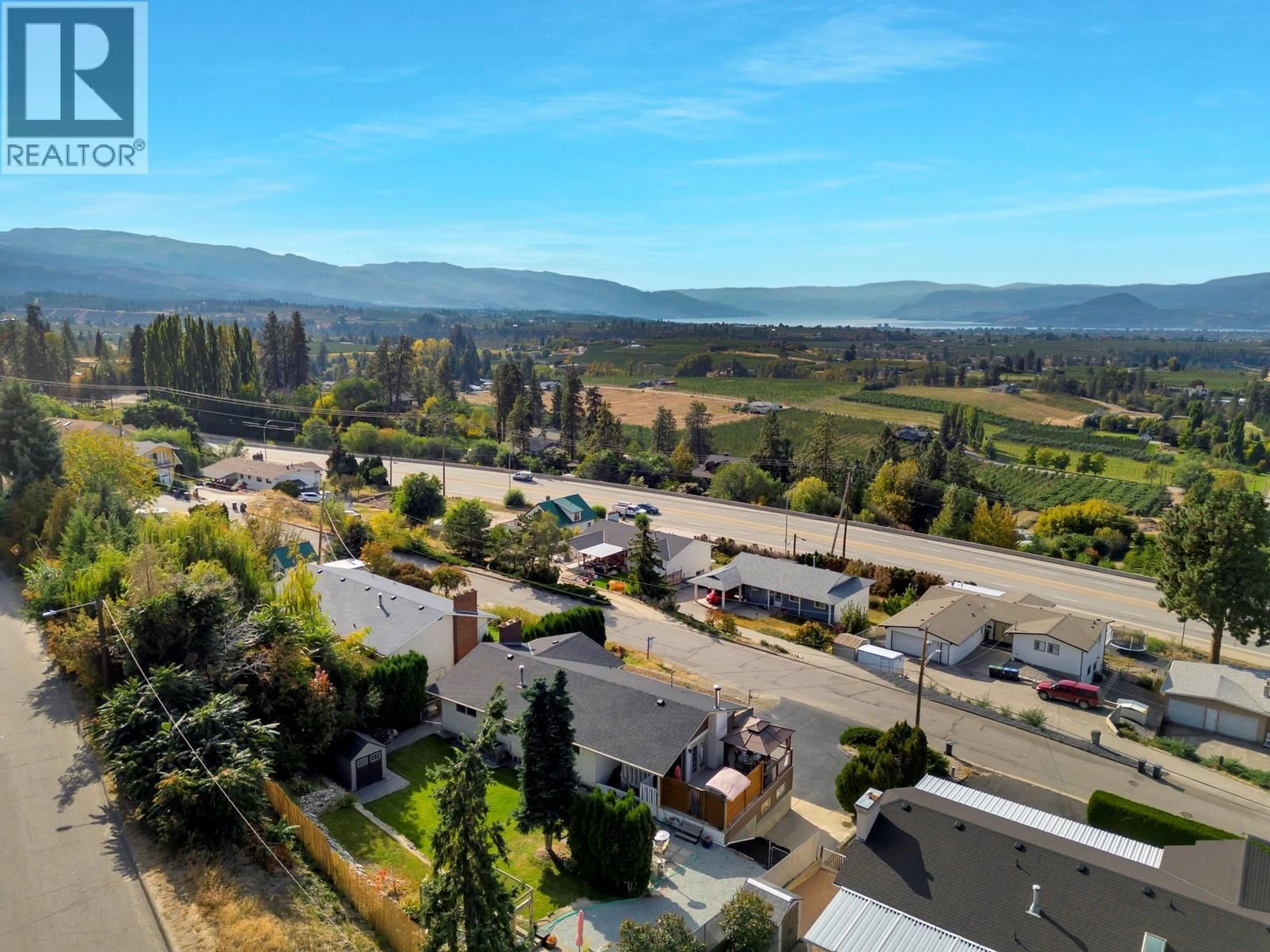 A pic from outside/outdoor area/front of a property/back of a property/a pic from drone, mountain view for 1197 BENTIEN ROAD, Kelowna British Columbia V1P1C7