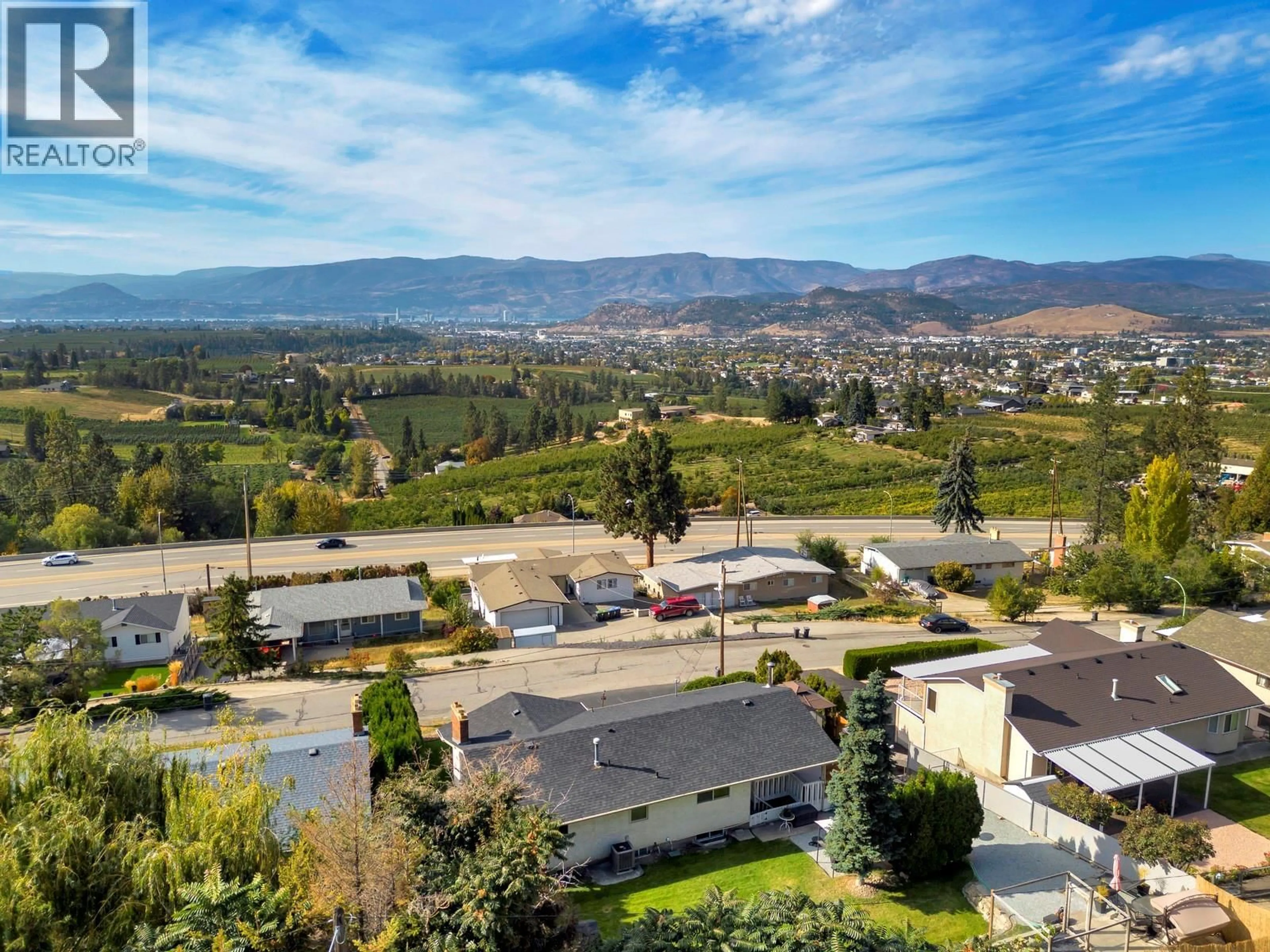 A pic from outside/outdoor area/front of a property/back of a property/a pic from drone, mountain view for 1197 BENTIEN ROAD, Kelowna British Columbia V1P1C7
