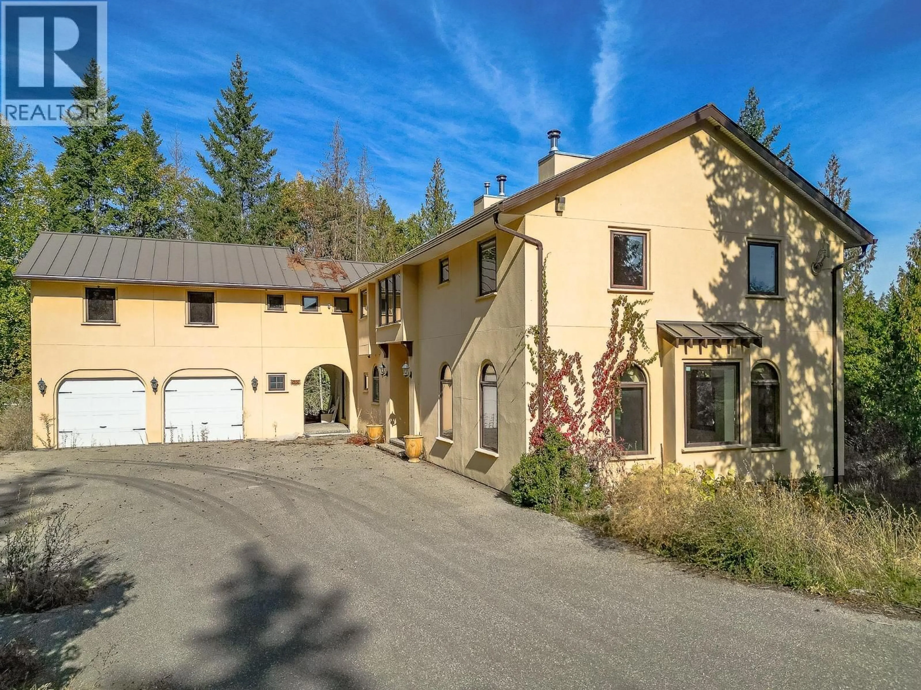 A pic from outside/outdoor area/front of a property/back of a property/a pic from drone, street for 141 CROSSRIDGE ROAD, Enderby British Columbia V0E1V3