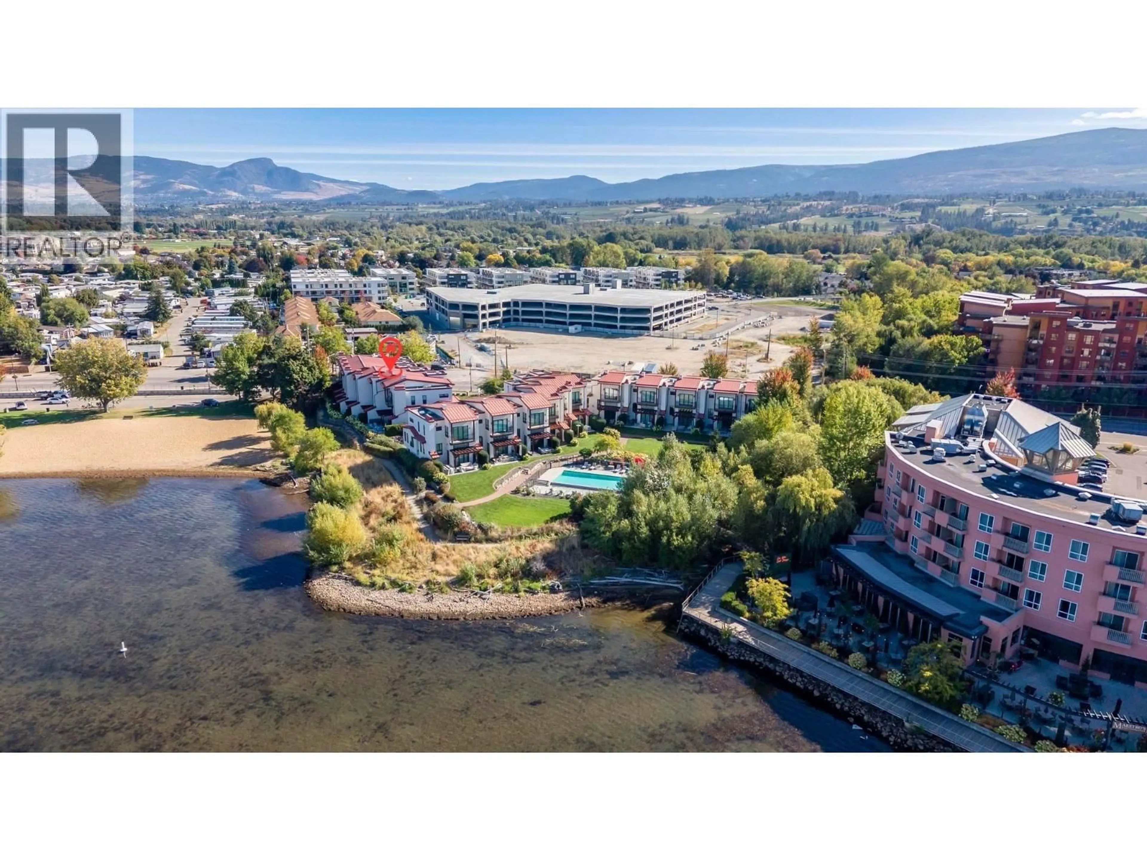 A pic from outside/outdoor area/front of a property/back of a property/a pic from drone, water/lake/river/ocean view for 13 - 3756 LAKESHORE ROAD, Kelowna British Columbia V1W3L4