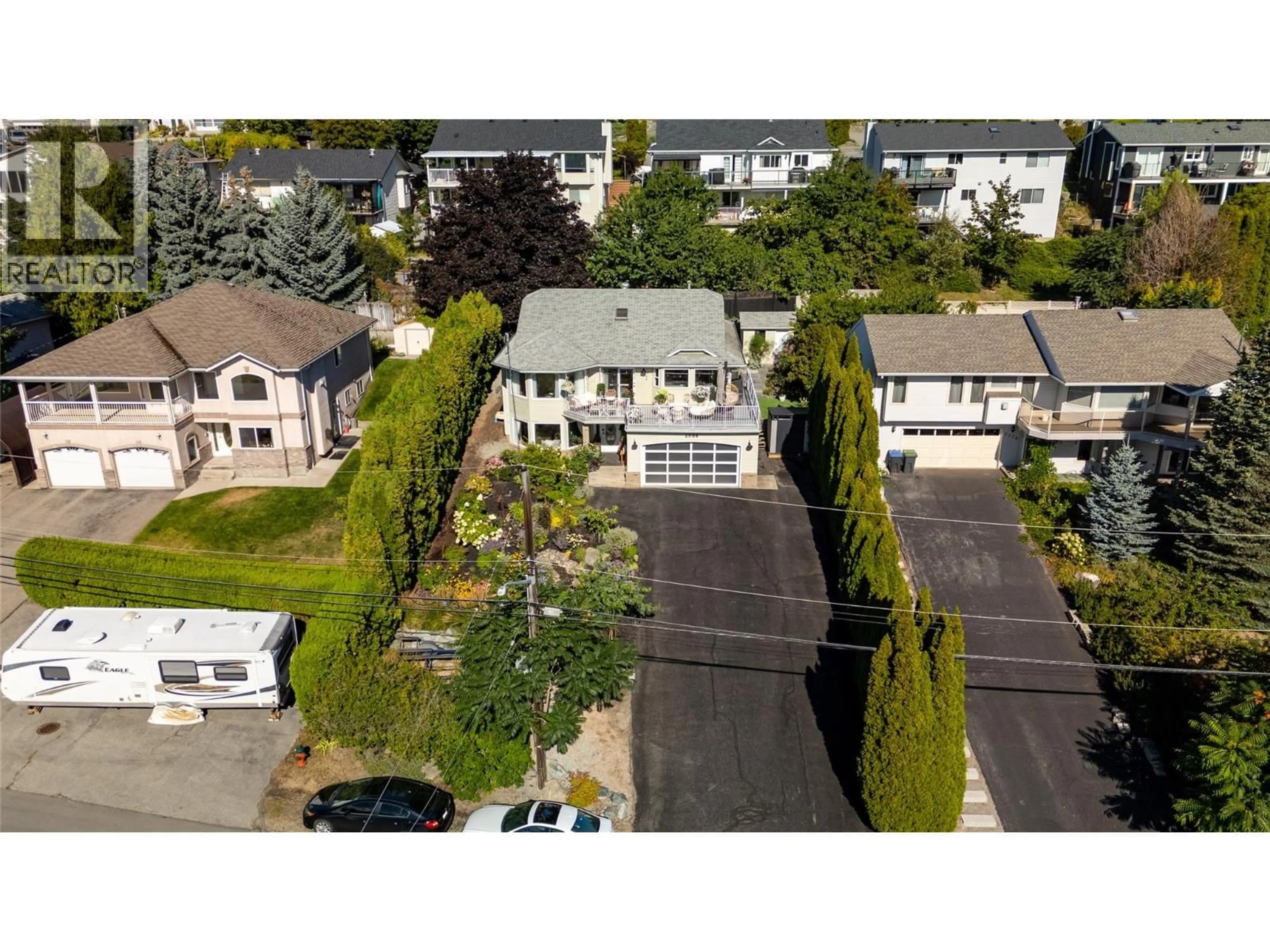 A pic from outside/outdoor area/front of a property/back of a property/a pic from drone, street for 2084 SHAMROCK DRIVE, West Kelowna British Columbia V4T1T8