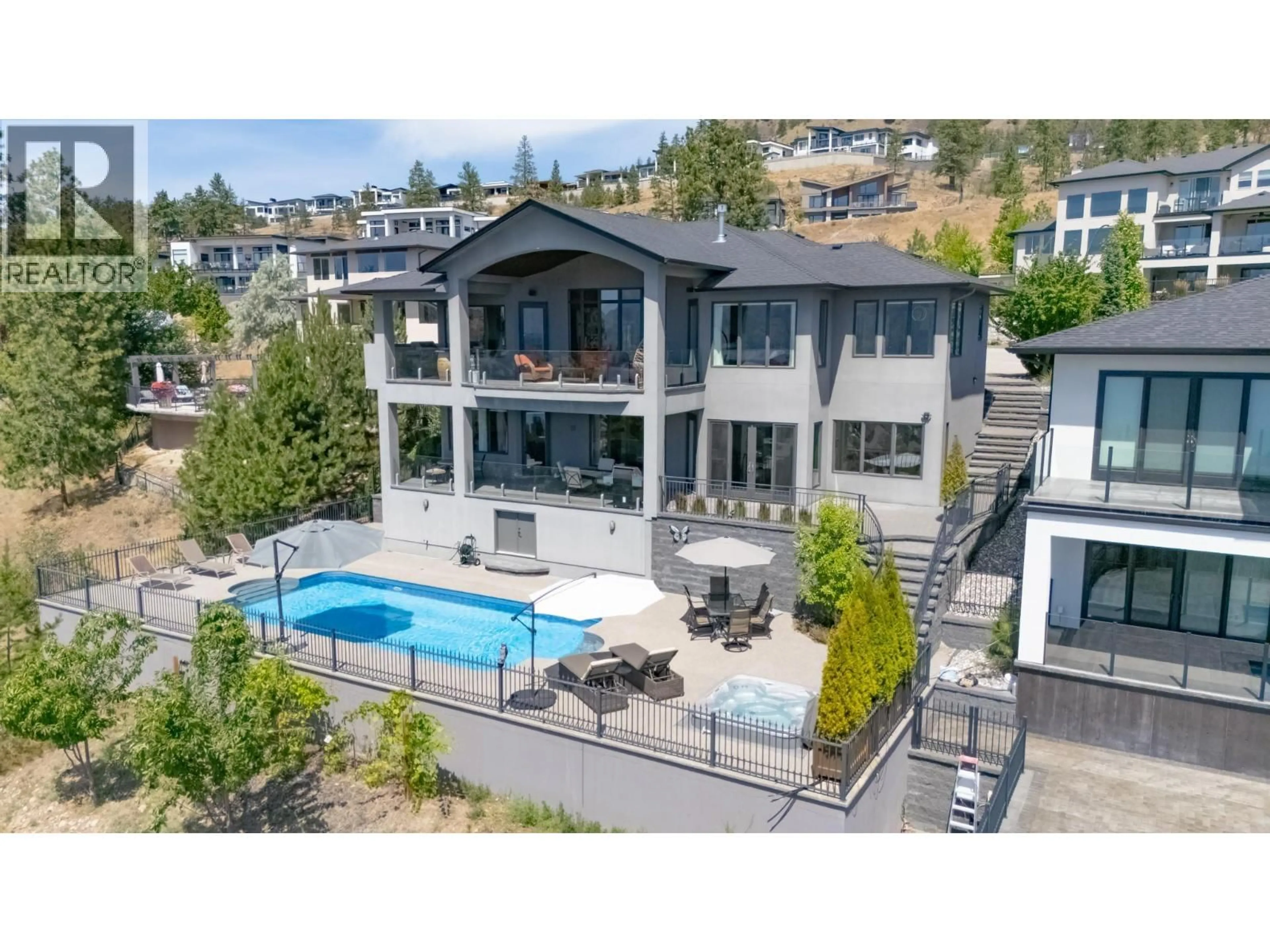 A pic from outside/outdoor area/front of a property/back of a property/a pic from drone, mountain view for 1505 PINOT NOIR DRIVE, West Kelowna British Columbia V4T3B4