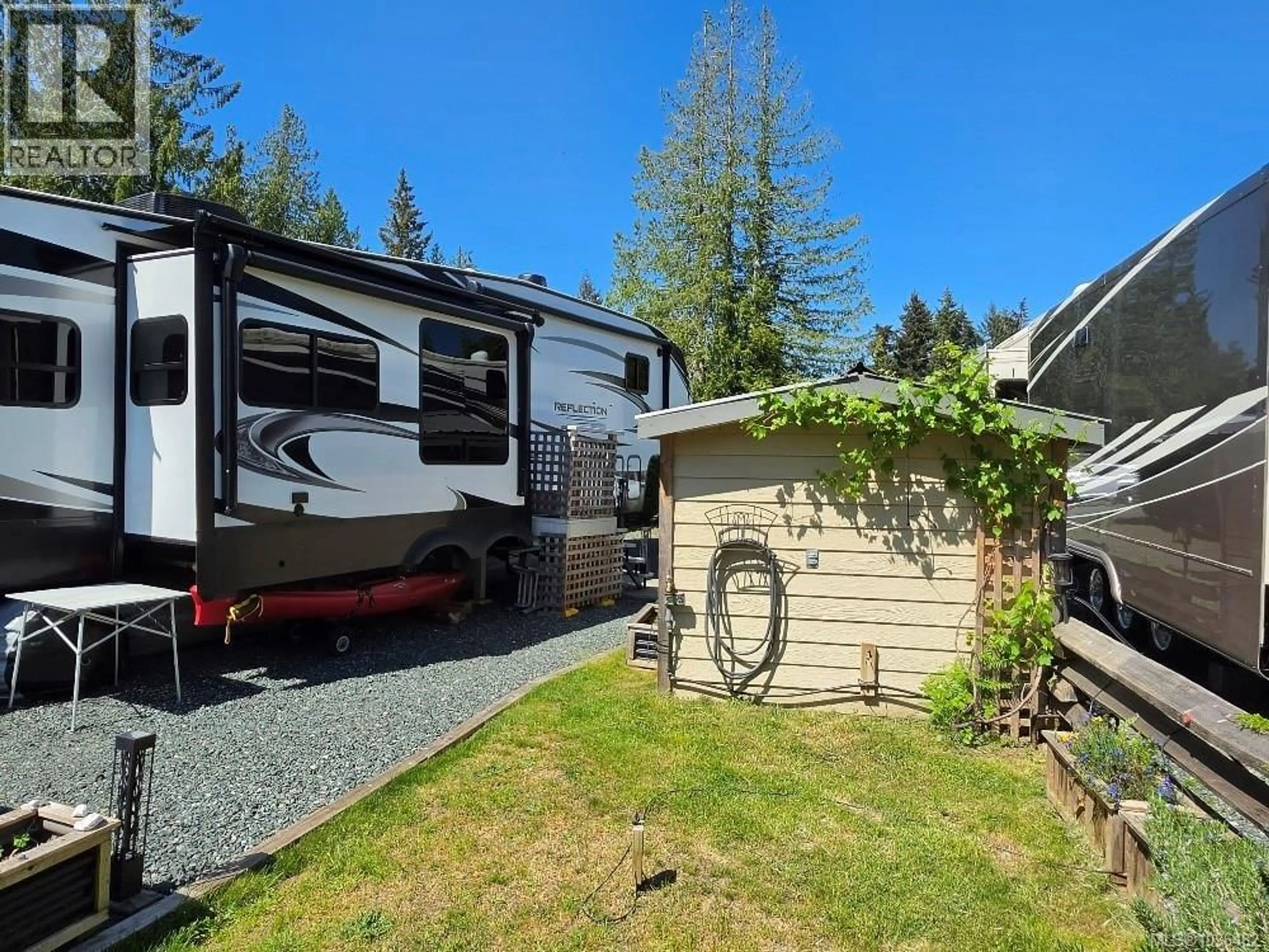 A pic from outside/outdoor area/front of a property/back of a property/a pic from drone, street for 58 - 6050 ISLAND HIGHWAY, Qualicum Beach British Columbia V9K2E1