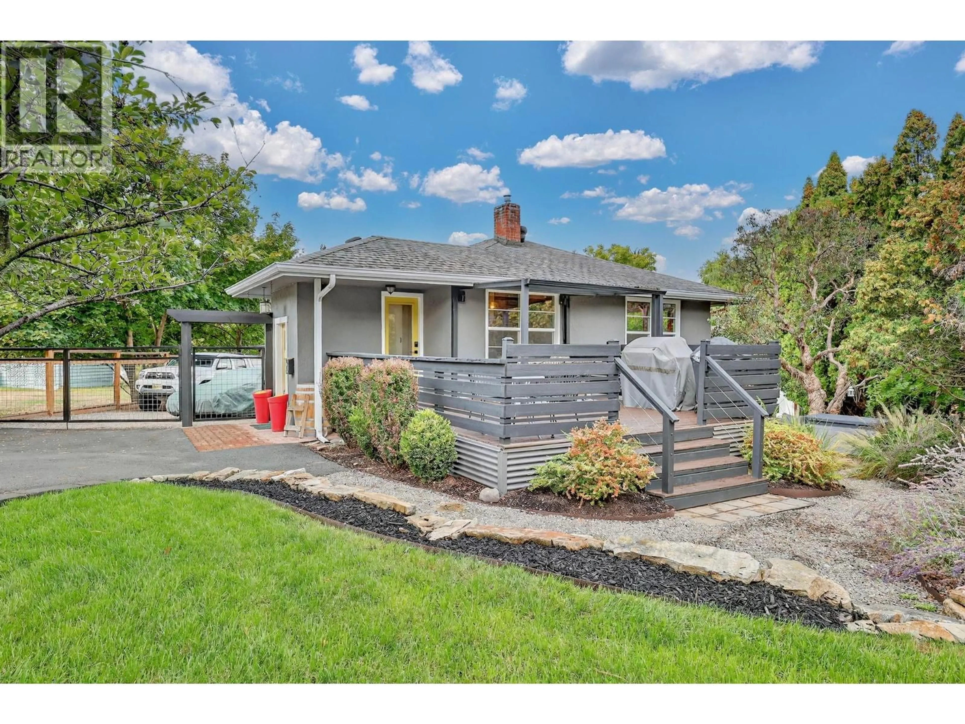 Home with vinyl exterior material, street for 1230 RIDGEWAY DRIVE, Kelowna British Columbia V1Y4M1