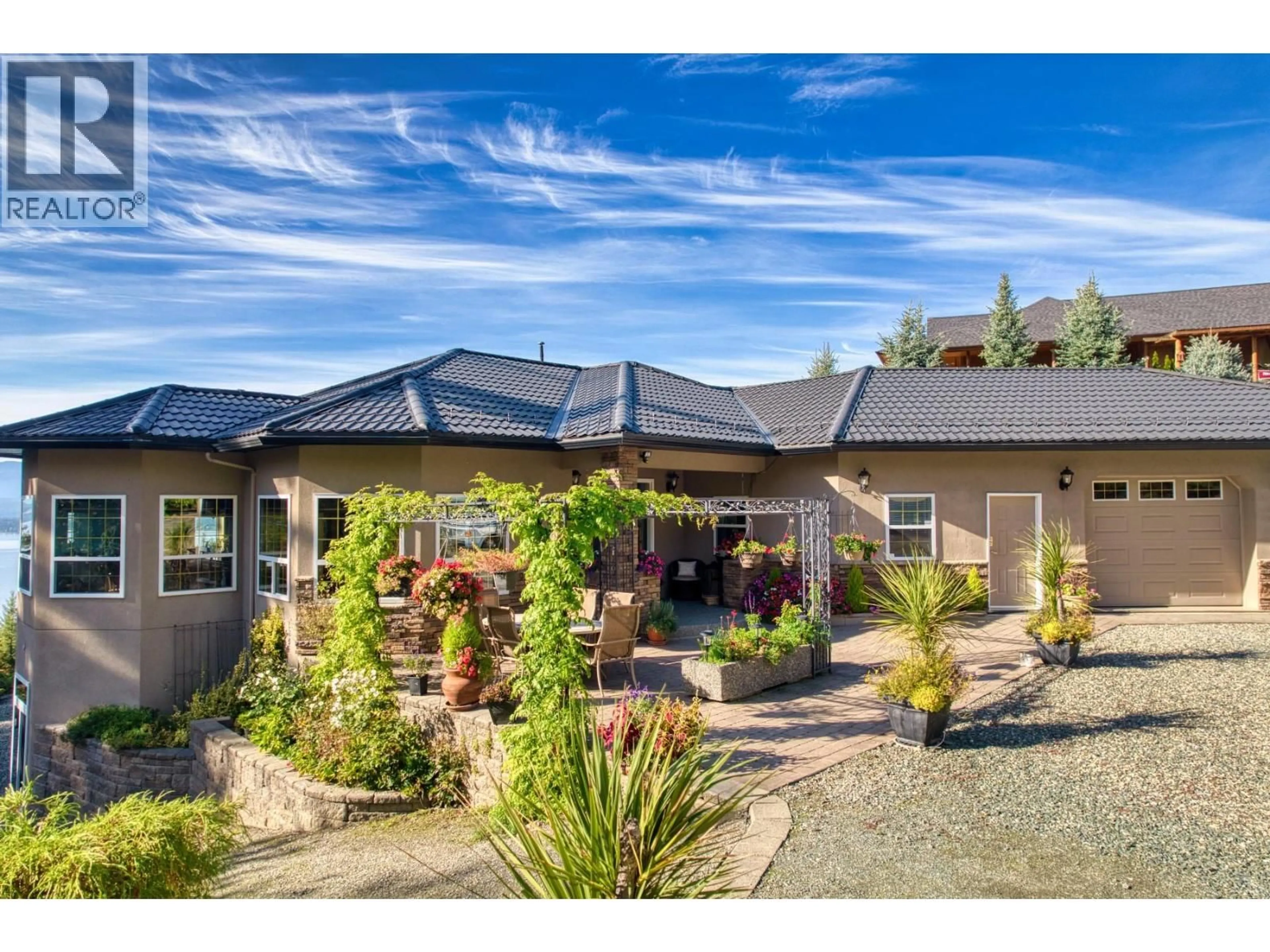 A pic from outside/outdoor area/front of a property/back of a property/a pic from drone, street for 3676 MCBRIDE ROAD, Blind Bay British Columbia V0E1H1