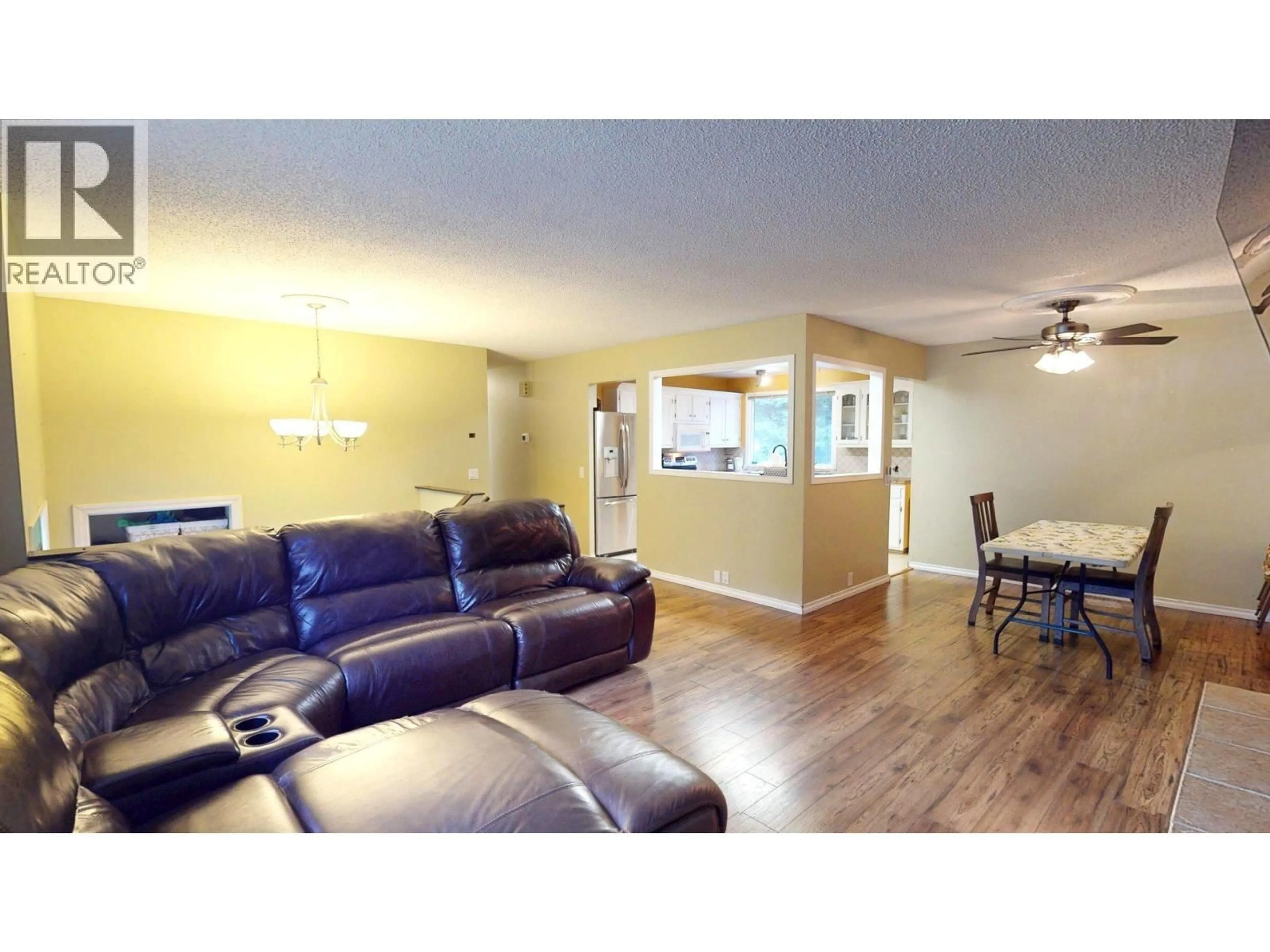 Living room with furniture, wood/laminate floor for 165 CODY CRESCENT, Elkford British Columbia V0B1H0