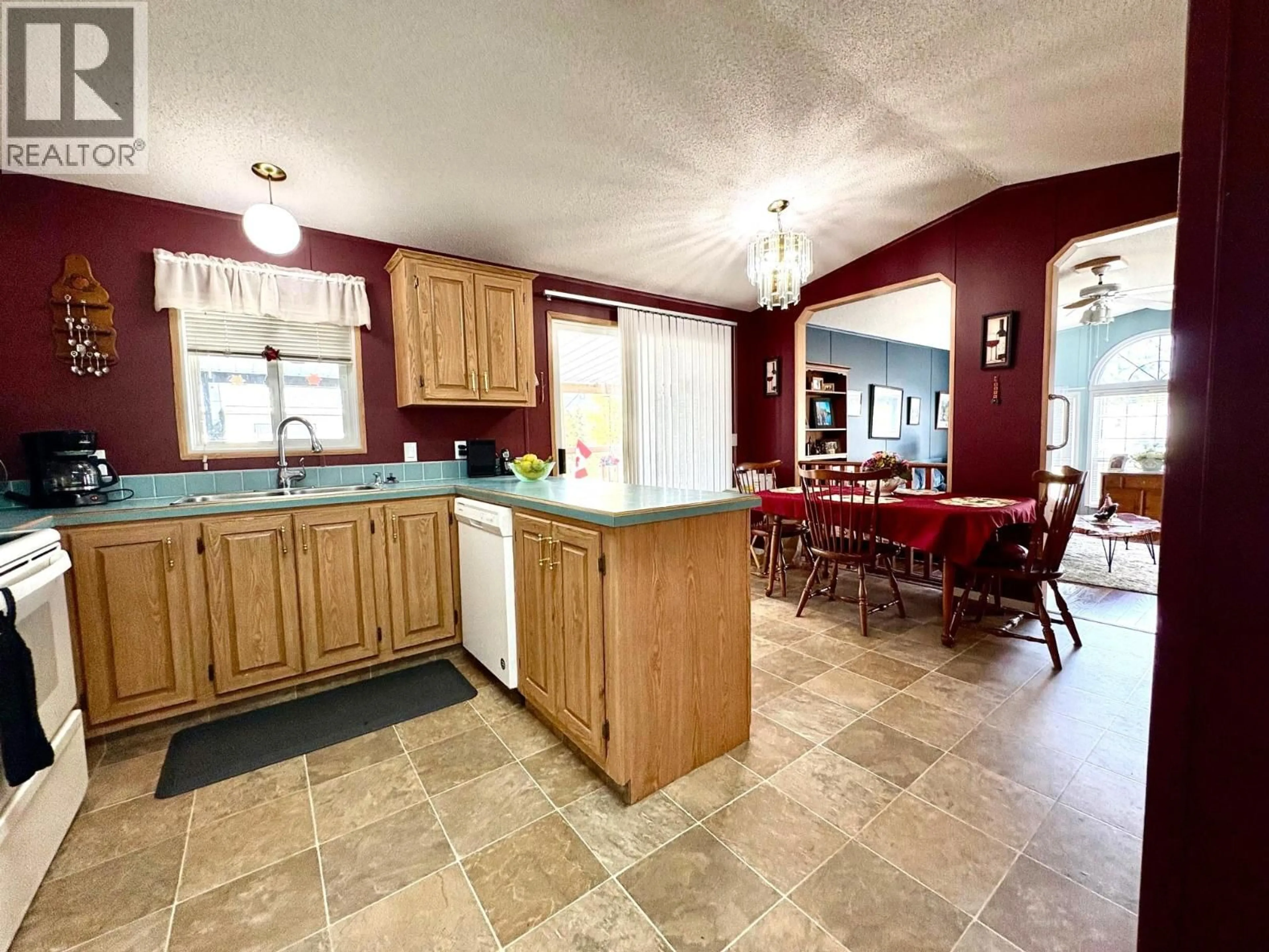 Open concept kitchen, ceramic/tile floor for 3 - 4510 POWER ROAD, Barriere British Columbia V0E1E0
