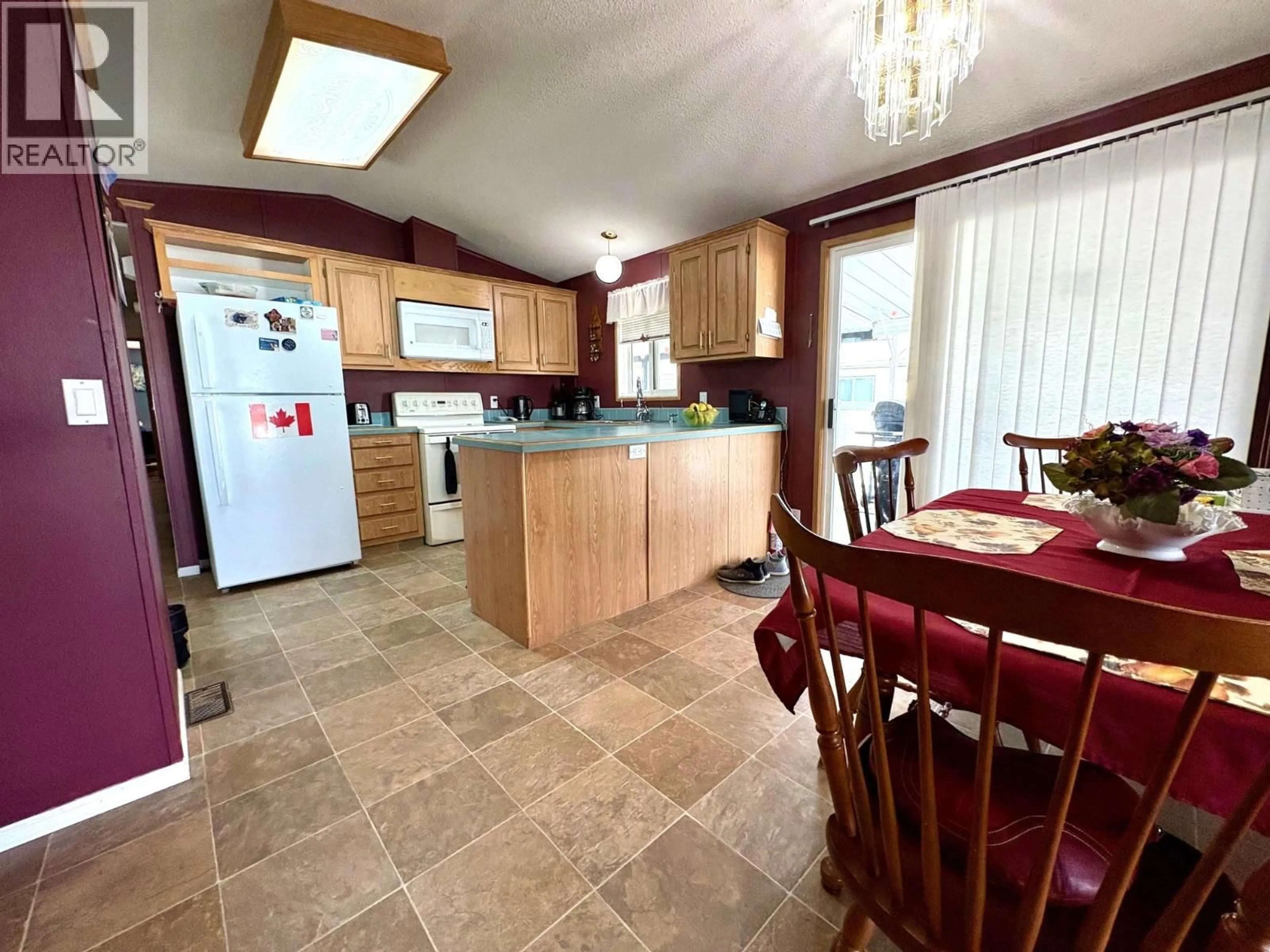 Open concept kitchen, ceramic/tile floor for 3 - 4510 POWER ROAD, Barriere British Columbia V0E1E0