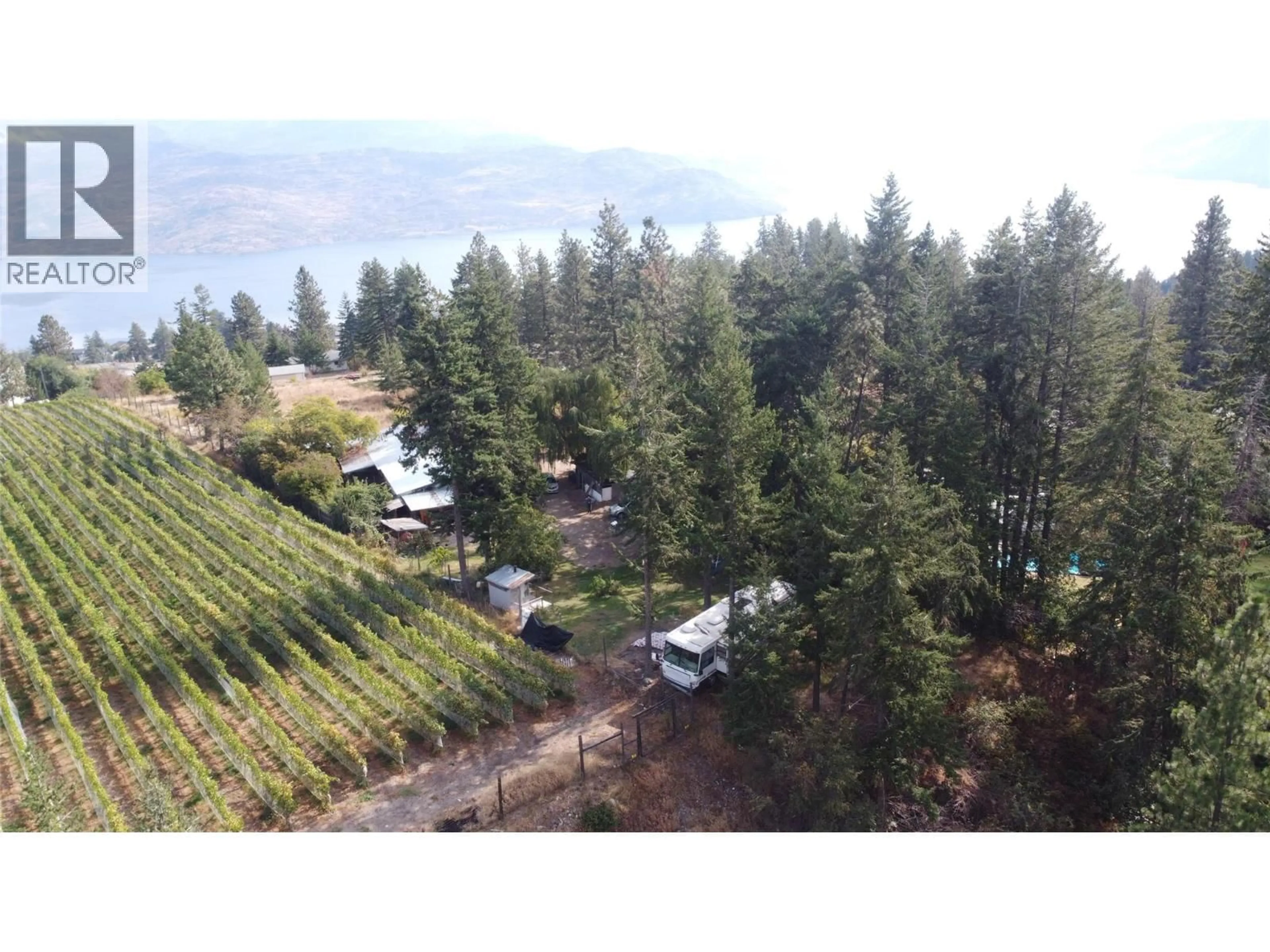 A pic from outside/outdoor area/front of a property/back of a property/a pic from drone, mountain view for 4976 NASH STREET, Peachland British Columbia V0H1X8