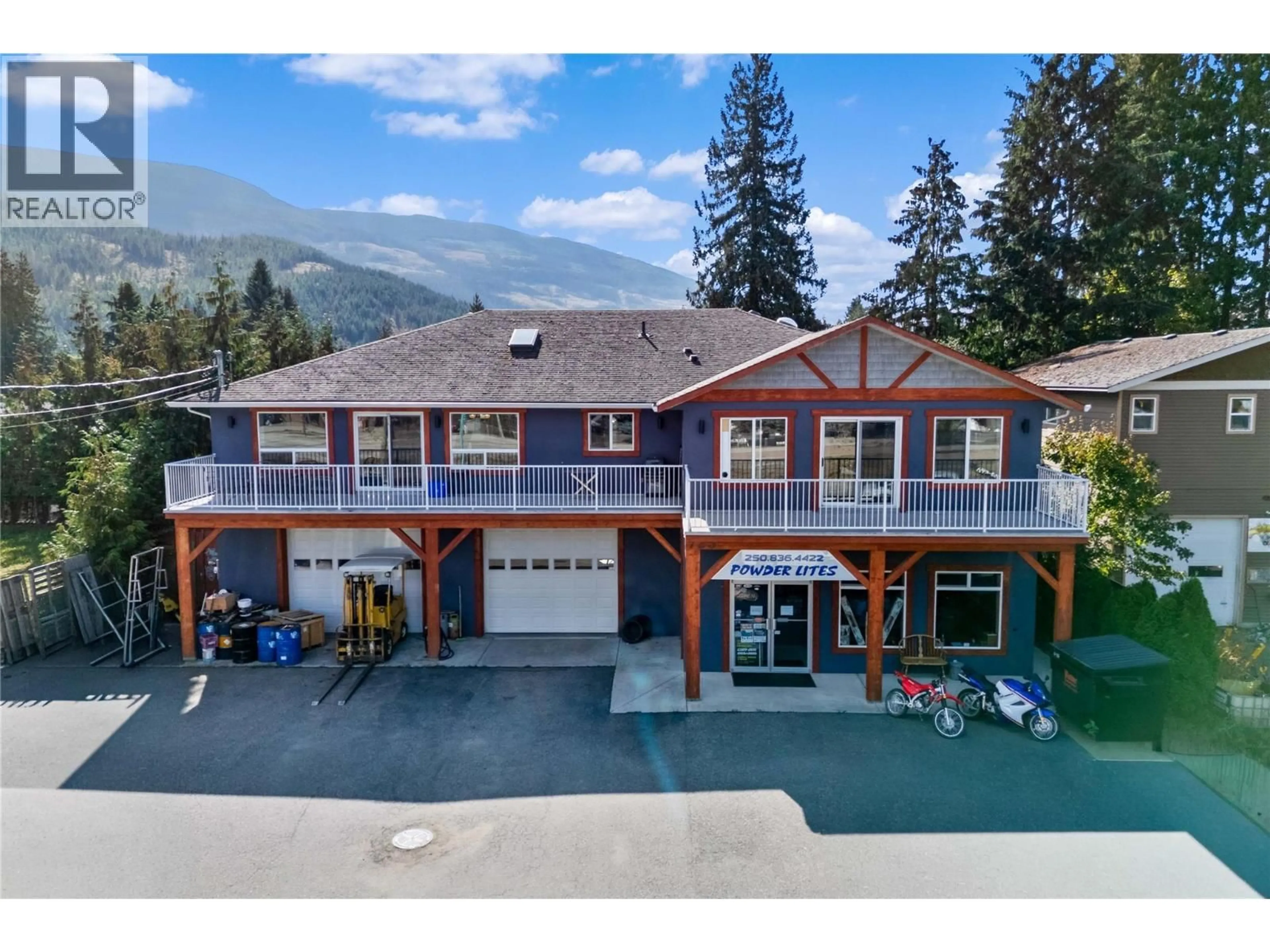 A pic from outside/outdoor area/front of a property/back of a property/a pic from drone, mountain view for 725 TRANS CANADA HIGHWAY, Sicamous British Columbia V0E2V0