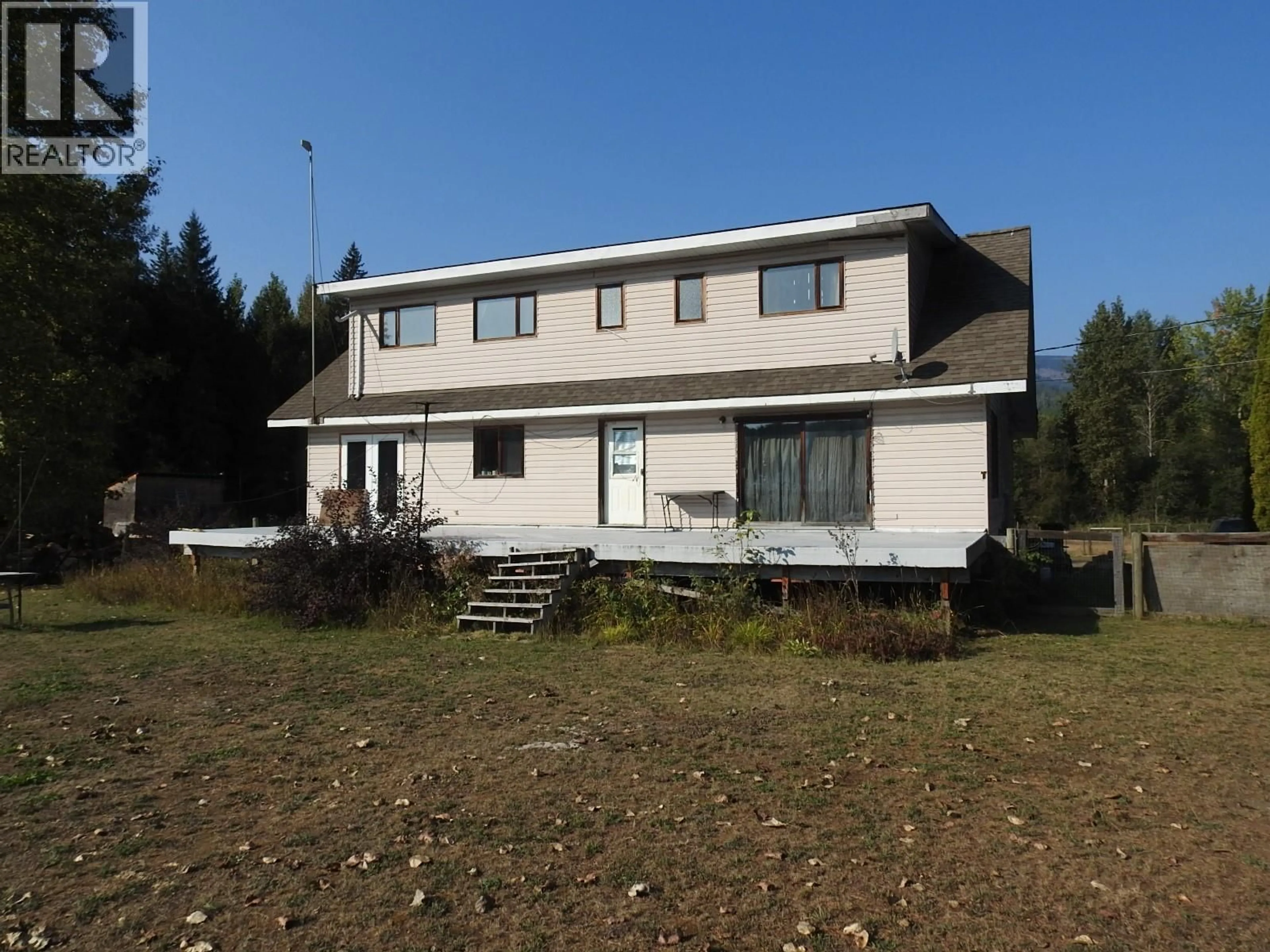 A pic from outside/outdoor area/front of a property/back of a property/a pic from drone, building for 1852 TRINITY VALLEY ROAD, Lumby British Columbia V0E2G4