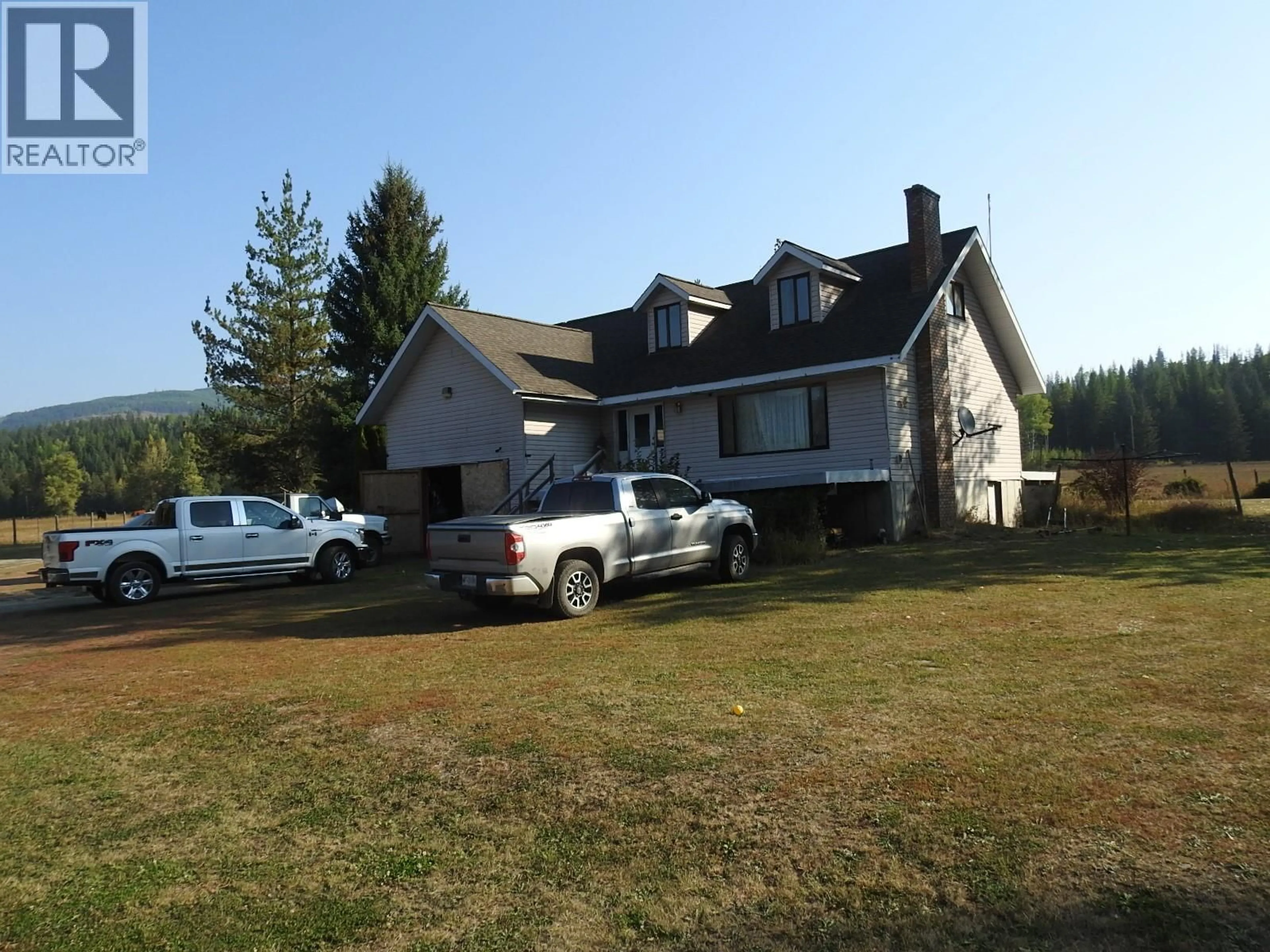 A pic from outside/outdoor area/front of a property/back of a property/a pic from drone, building for 1852 TRINITY VALLEY ROAD, Lumby British Columbia V0E2G4