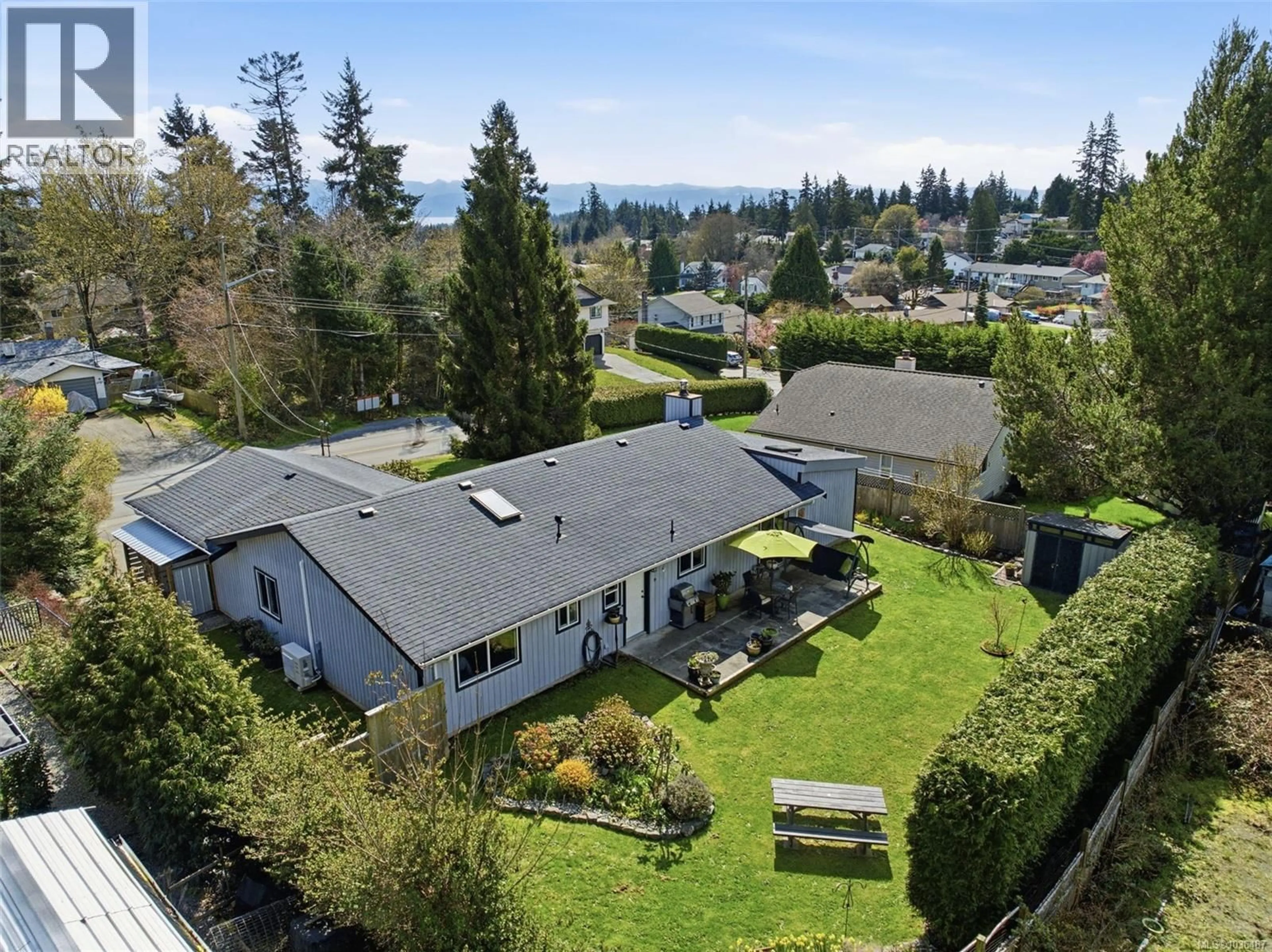 A pic from outside/outdoor area/front of a property/back of a property/a pic from drone, mountain view for 6728 EAKIN DRIVE, Sooke British Columbia V9Z0V4