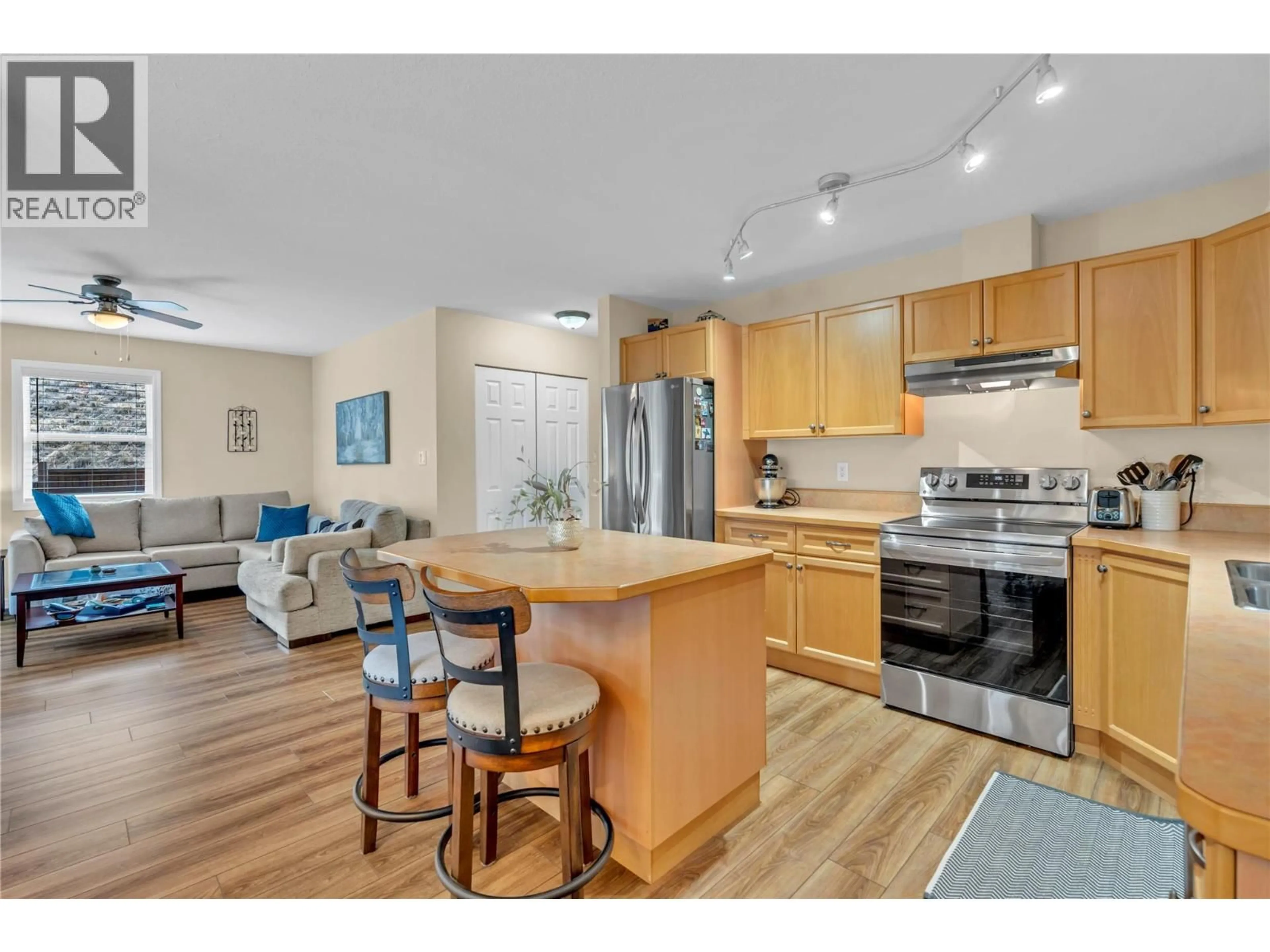 Open concept kitchen, wood/laminate floor for 25 - 7915 HESPELER ROAD, Summerland British Columbia V0H1Z4