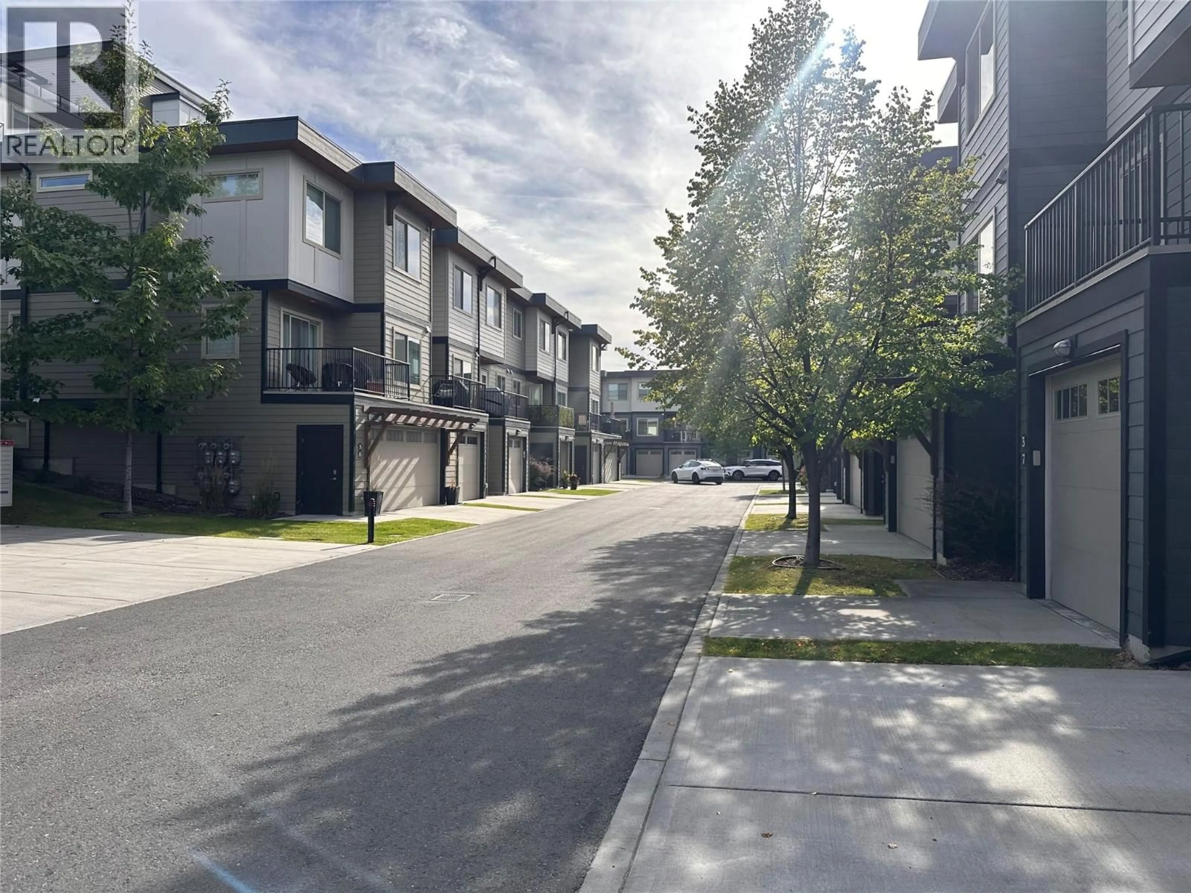 A pic from outside/outdoor area/front of a property/back of a property/a pic from drone, street for 37 - 3626 MISSION SPRINGS DRIVE, Kelowna British Columbia V1W5L1