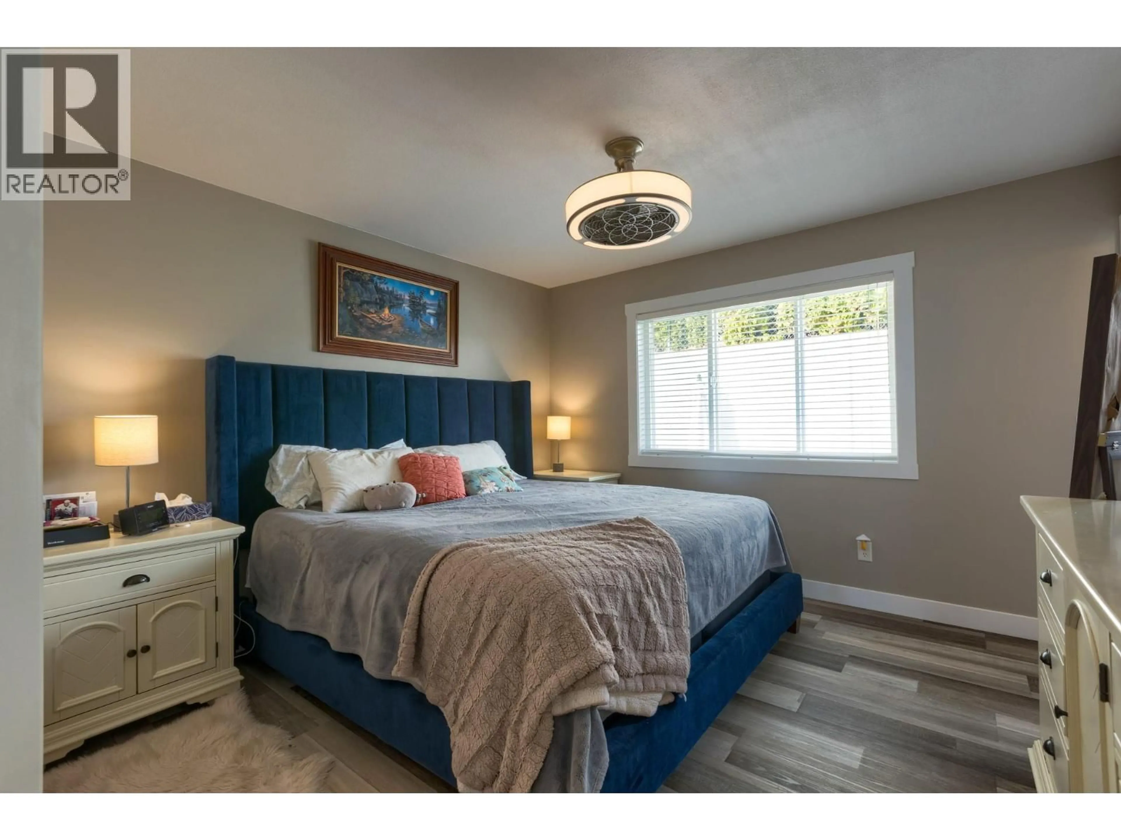Bedroom with bed, wood/laminate floor for 3632 MORNINGSIDE DRIVE, West Kelowna British Columbia V4T2T7