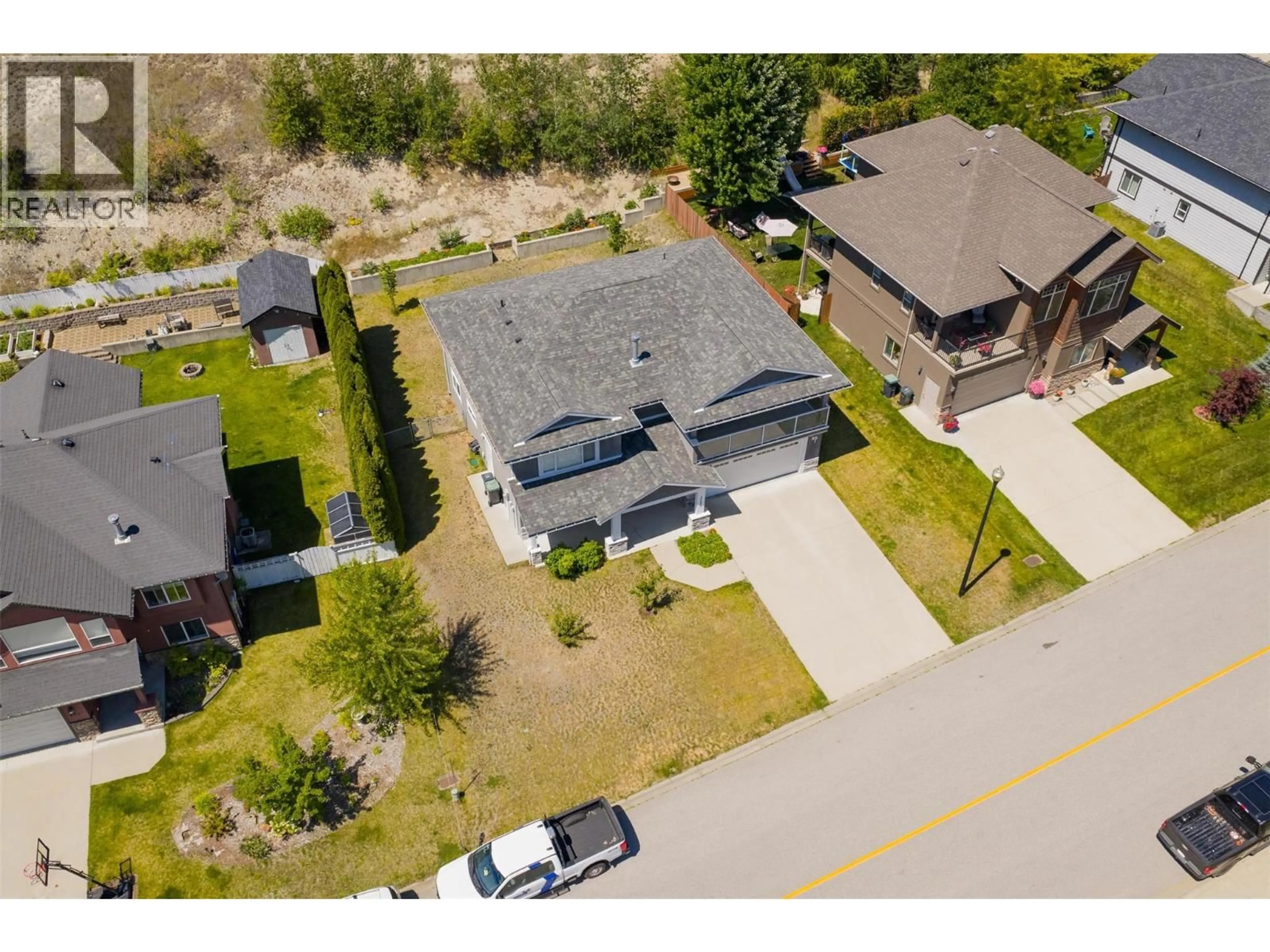 A pic from outside/outdoor area/front of a property/back of a property/a pic from drone, street for 3720 5TH AVENUE, Castlegar British Columbia V1N4Y3