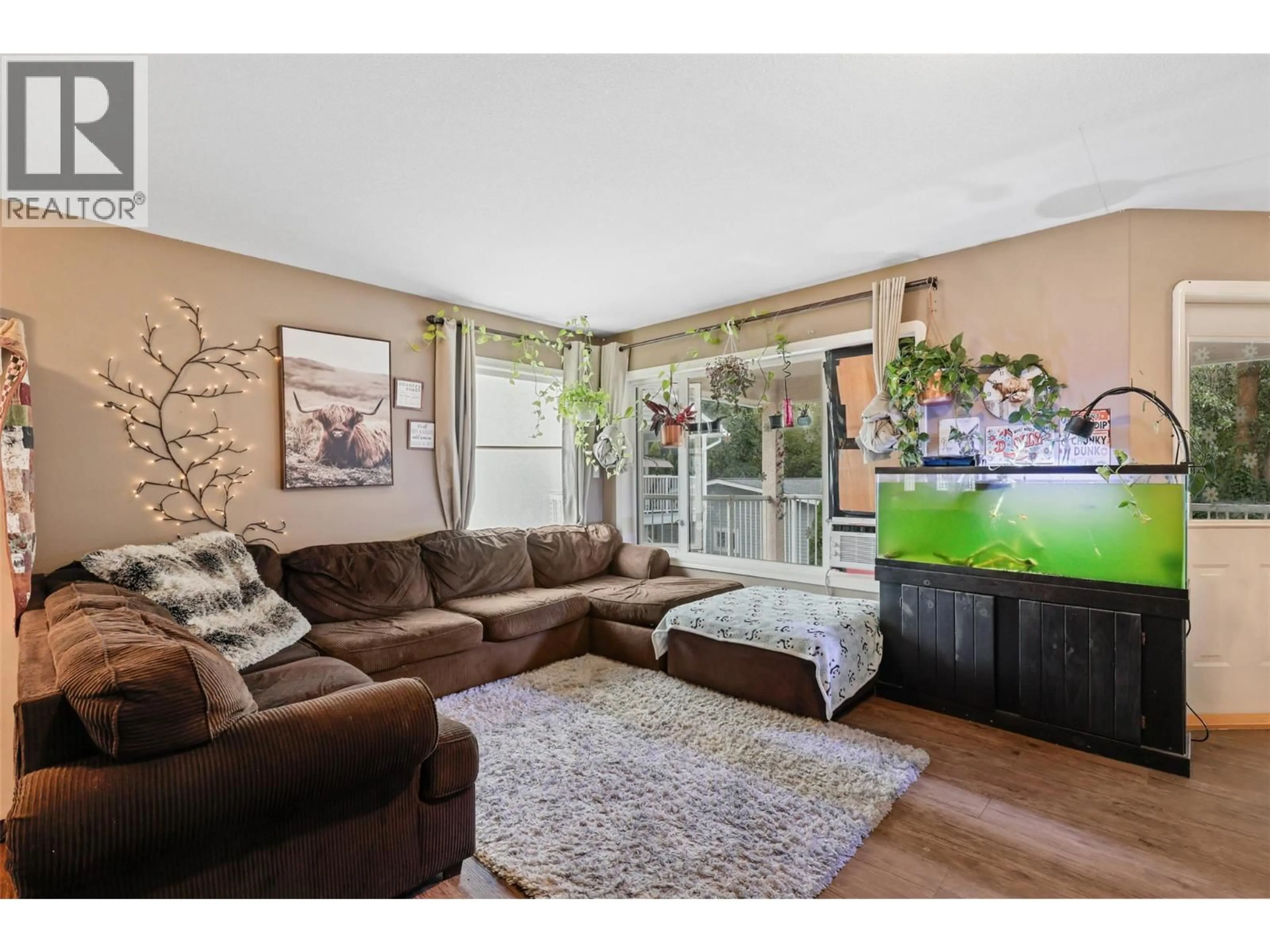 Living room with furniture, wood/laminate floor for 360 JUNIPER STREET, Chase British Columbia V0E1M0