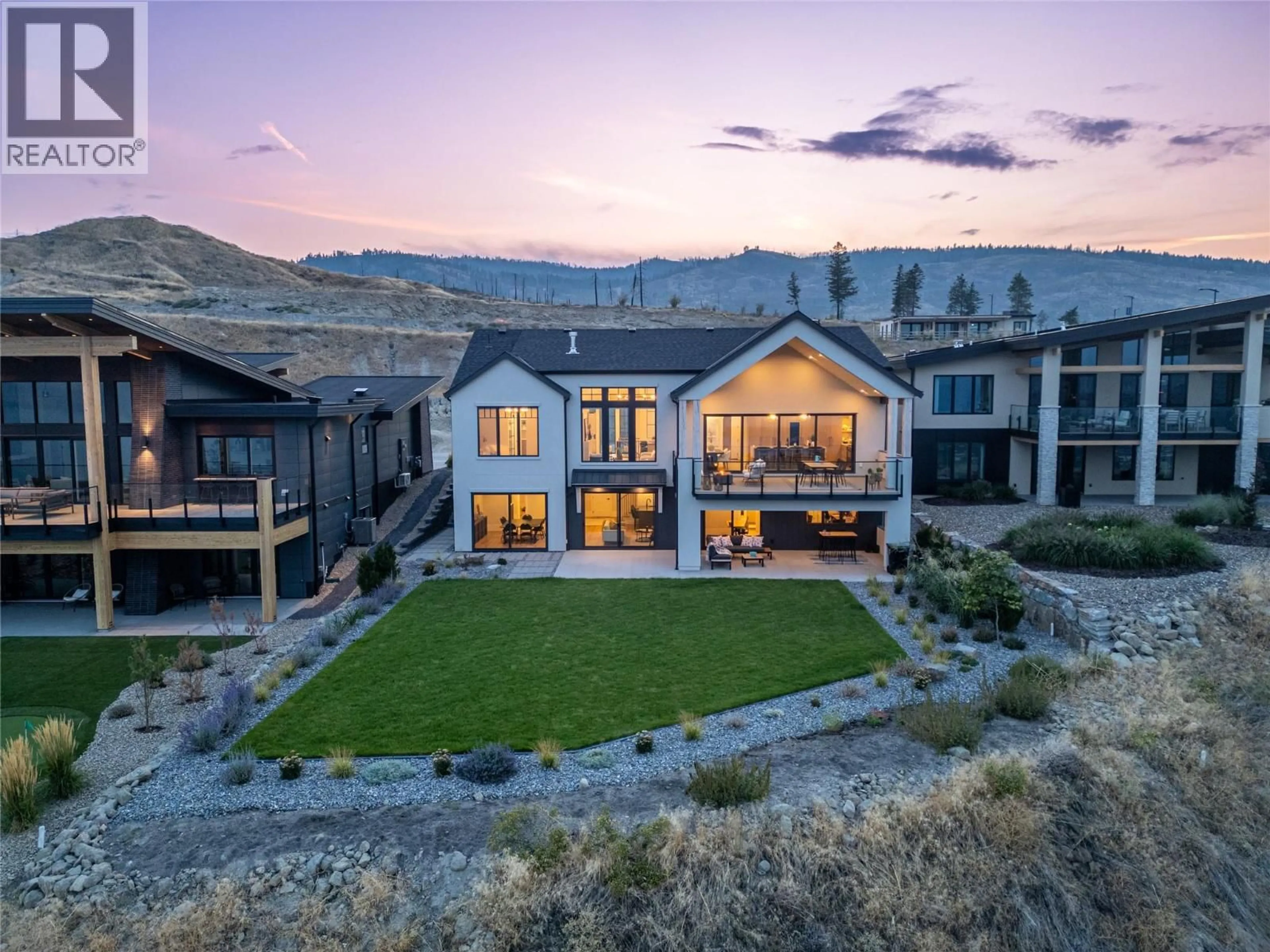 A pic from outside/outdoor area/front of a property/back of a property/a pic from drone, mountain view for 4023 SUNSTONE STREET, West Kelowna British Columbia V4T2K6