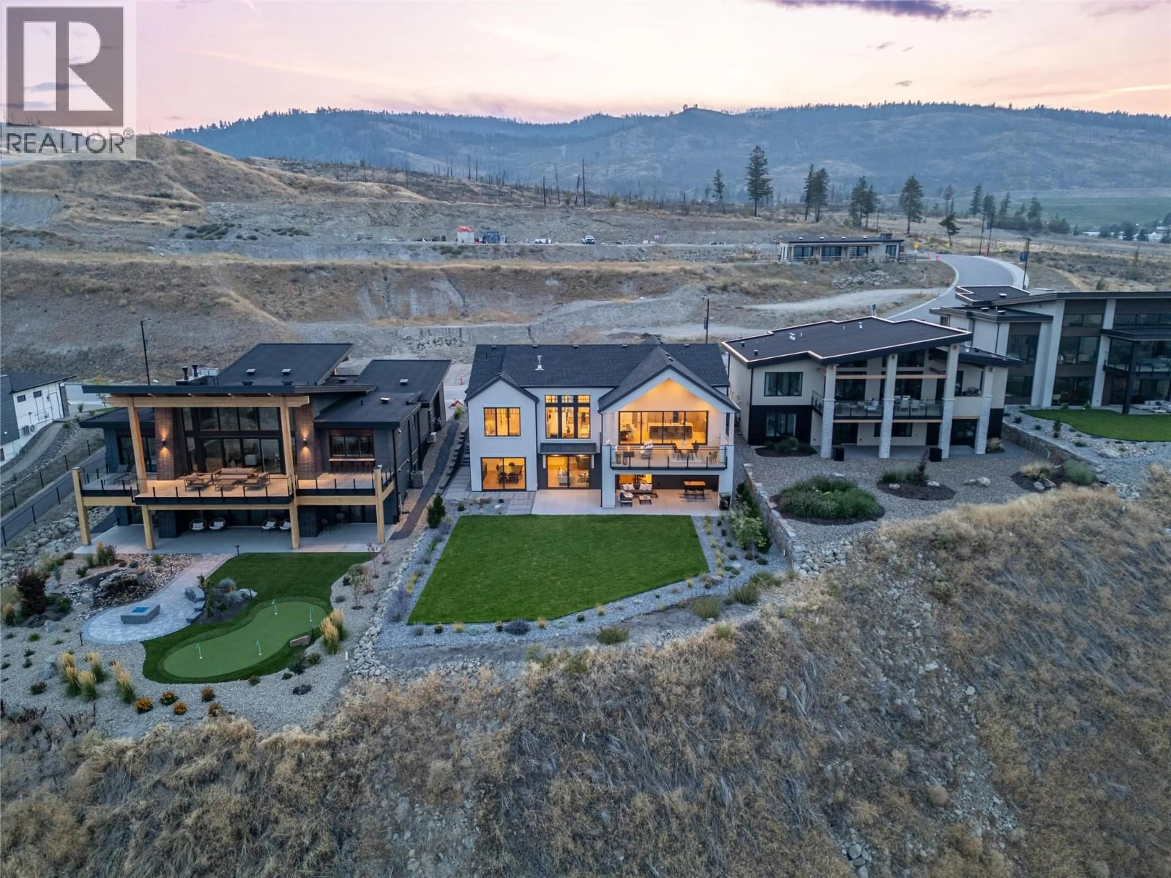 A pic from outside/outdoor area/front of a property/back of a property/a pic from drone, mountain view for 4023 SUNSTONE STREET, West Kelowna British Columbia V4T2K6