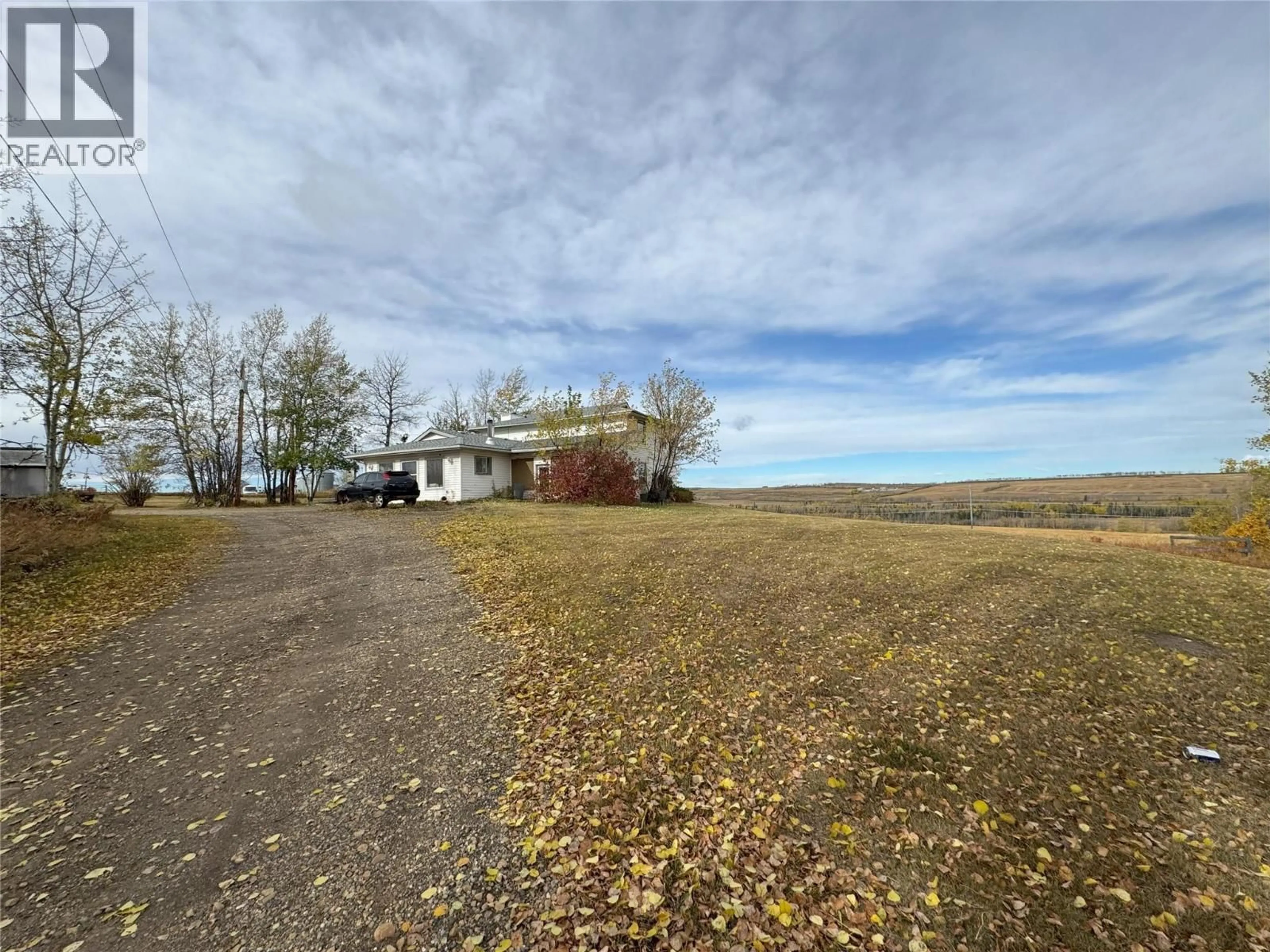 A pic from outside/outdoor area/front of a property/back of a property/a pic from drone, water/lake/river/ocean view for 8283 227 ROAD, Dawson Creek British Columbia V1G4E7