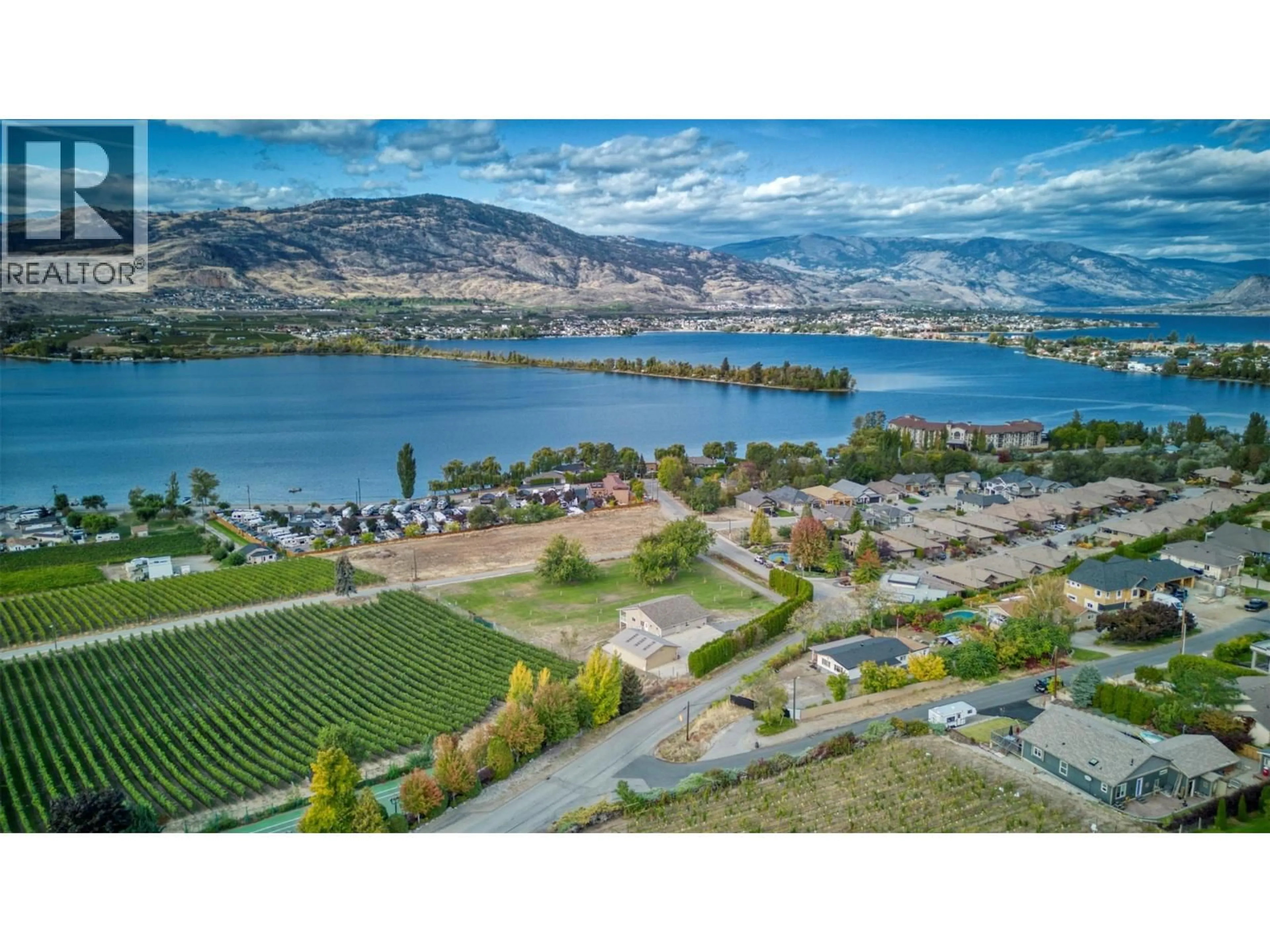 A pic from outside/outdoor area/front of a property/back of a property/a pic from drone, water/lake/river/ocean view for 3251 41ST STREET, Osoyoos British Columbia V0H1V6