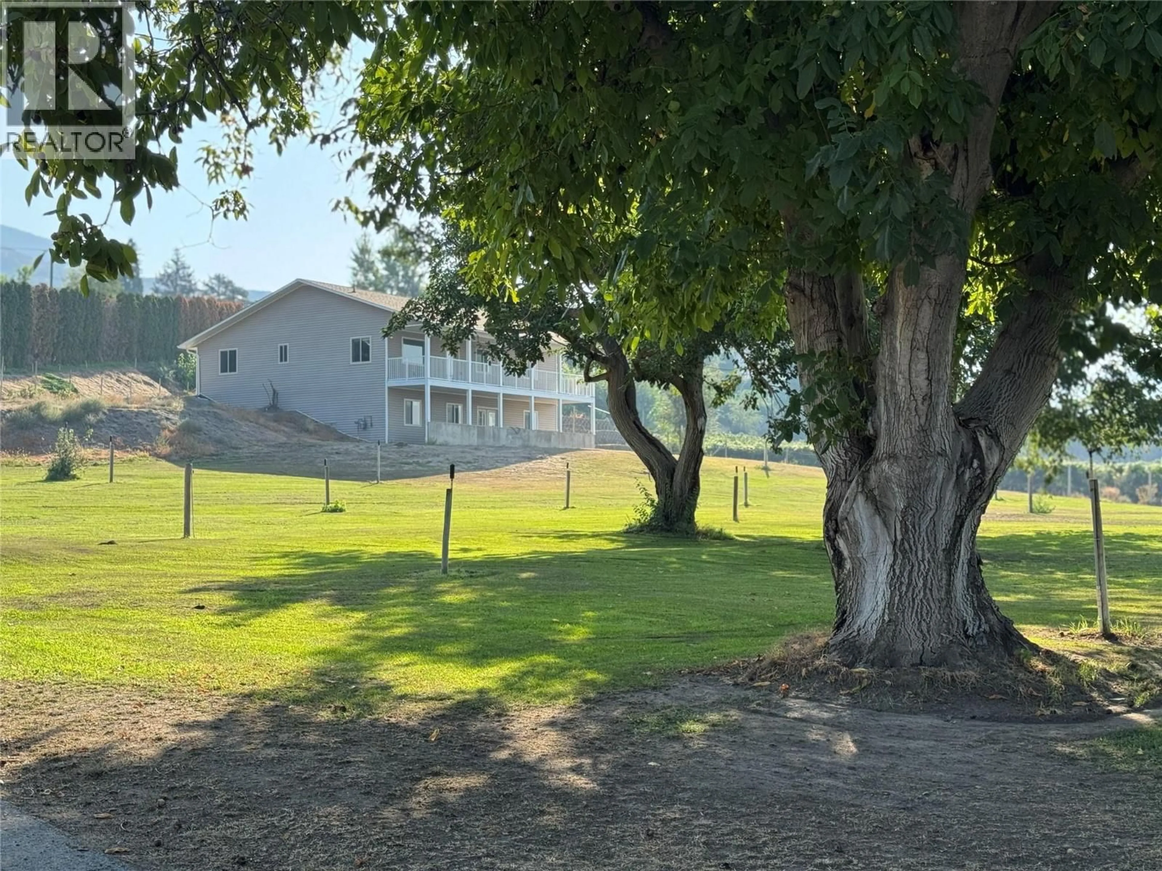 A pic from outside/outdoor area/front of a property/back of a property/a pic from drone, mountain view for 3251 41ST STREET, Osoyoos British Columbia V0H1V6