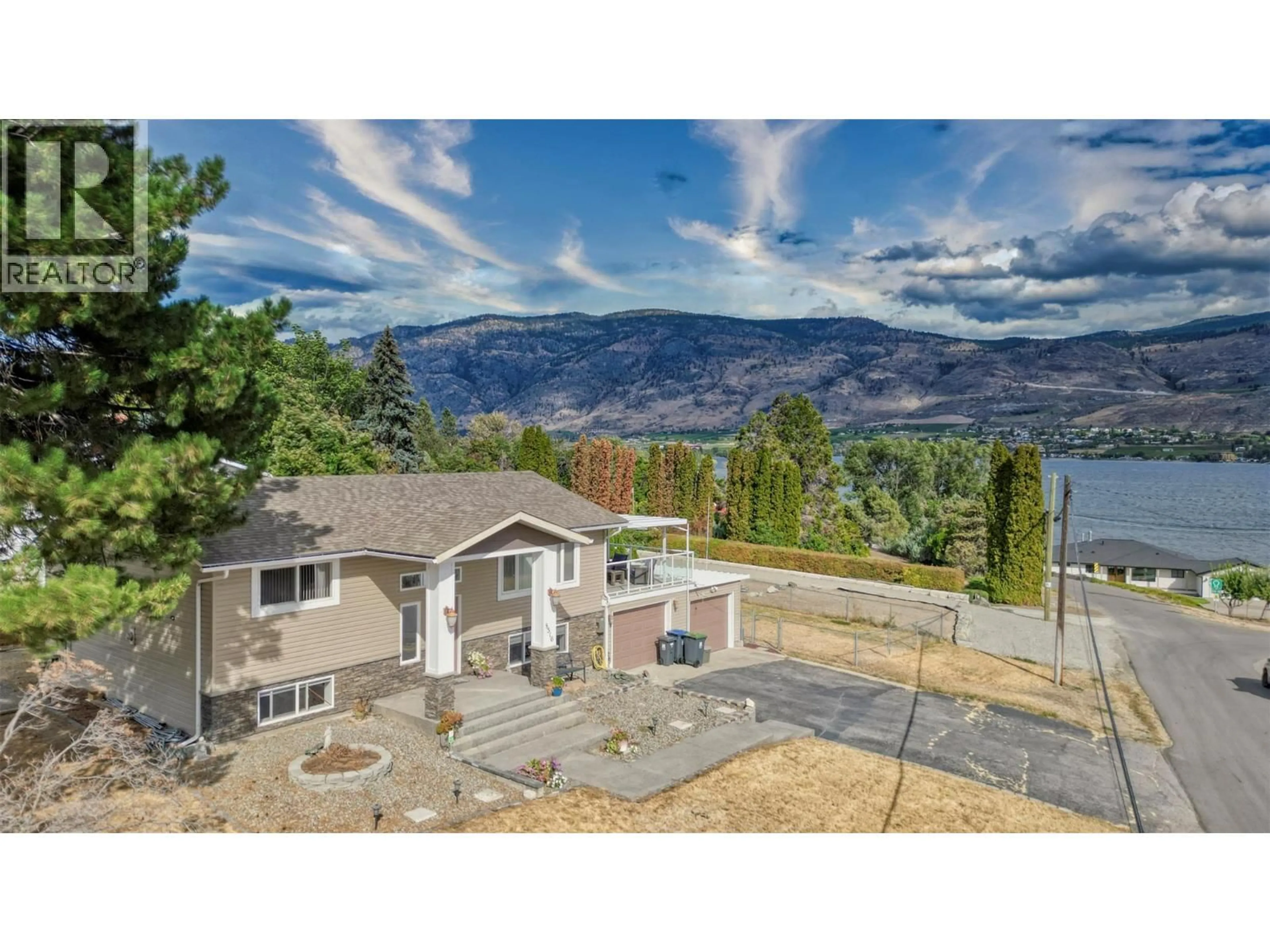 A pic from outside/outdoor area/front of a property/back of a property/a pic from drone, water/lake/river/ocean view for 8516 12TH AVENUE, Osoyoos British Columbia V0H1V1