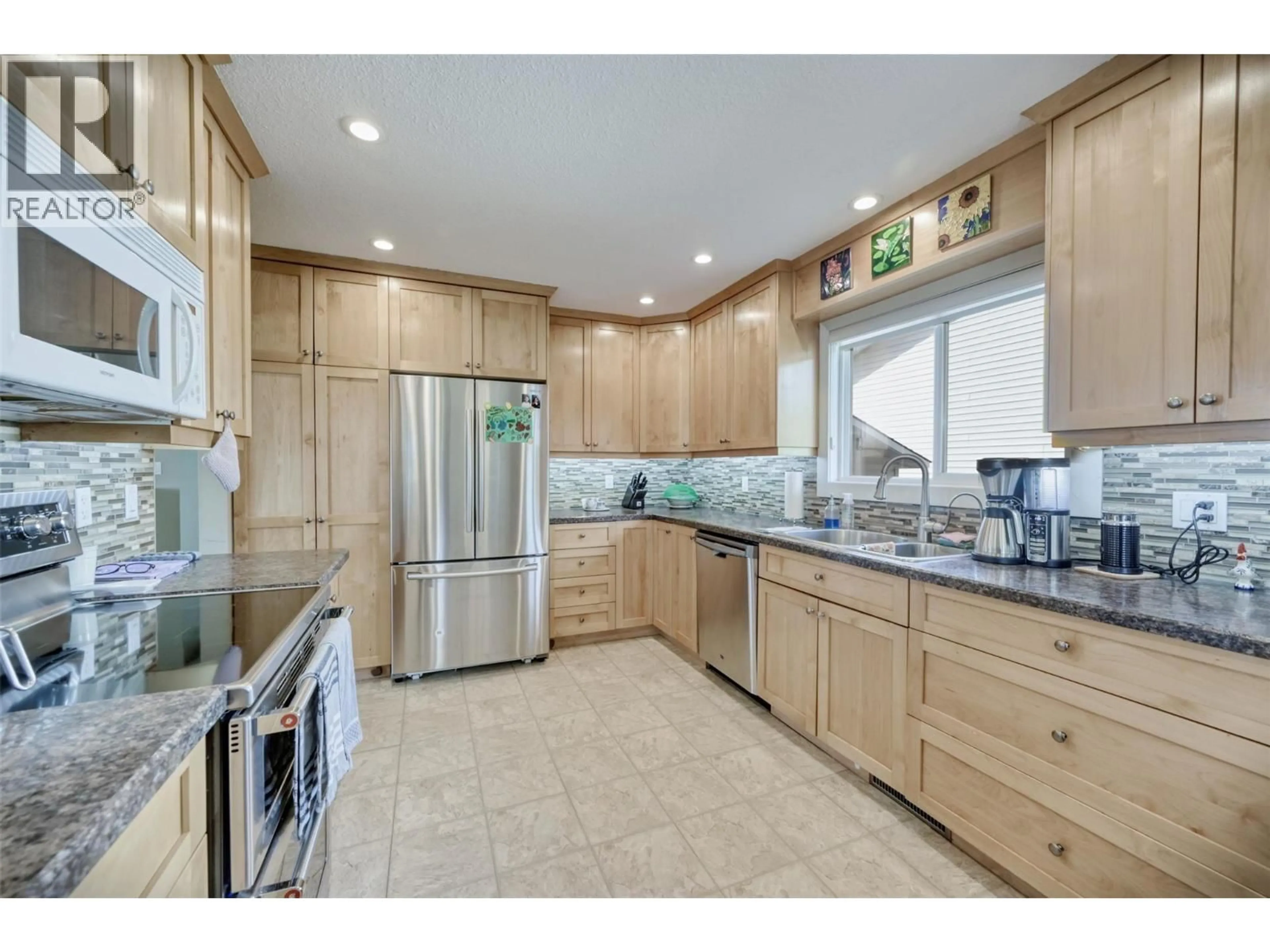 Open concept kitchen, ceramic/tile floor for 8516 12TH AVENUE, Osoyoos British Columbia V0H1V1