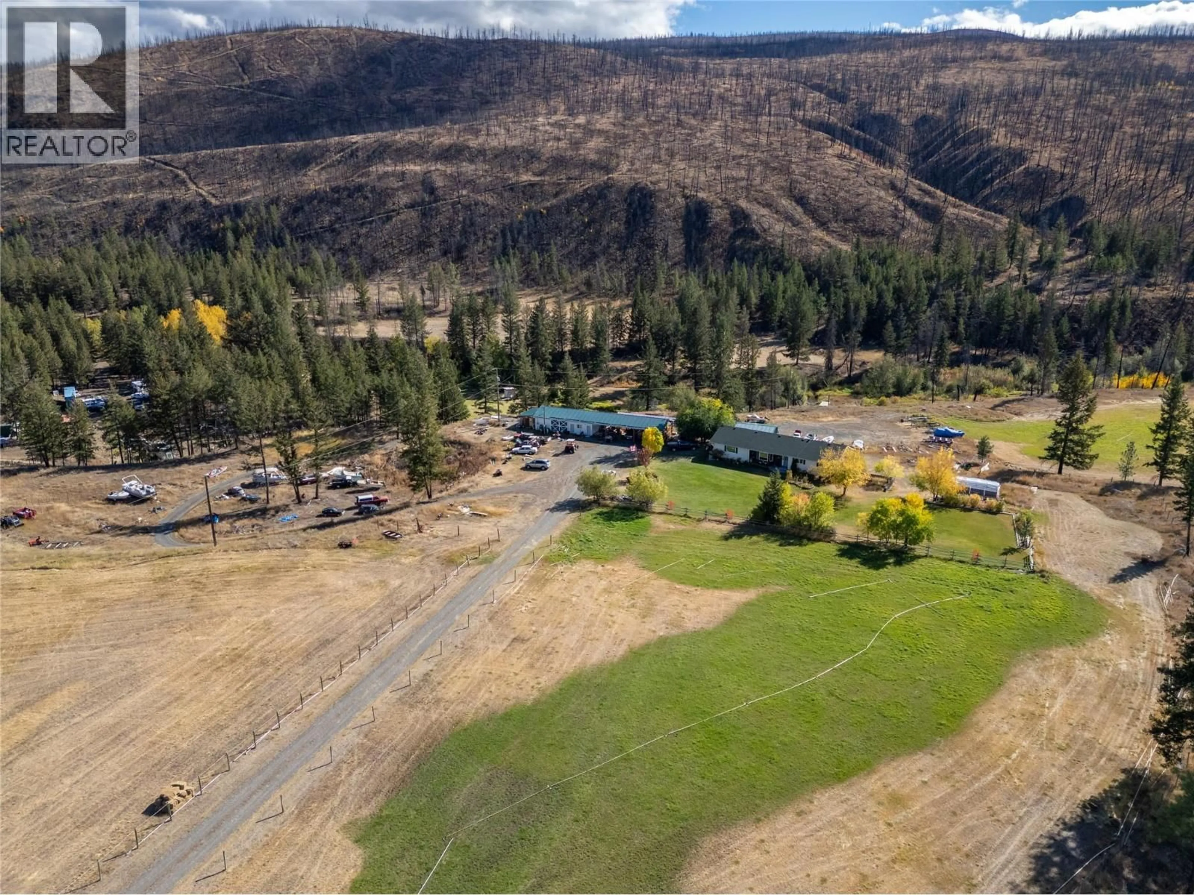 A pic from outside/outdoor area/front of a property/back of a property/a pic from drone, mountain view for 1424 LOON LAKE ROAD, Loon Lake British Columbia V0K1H1